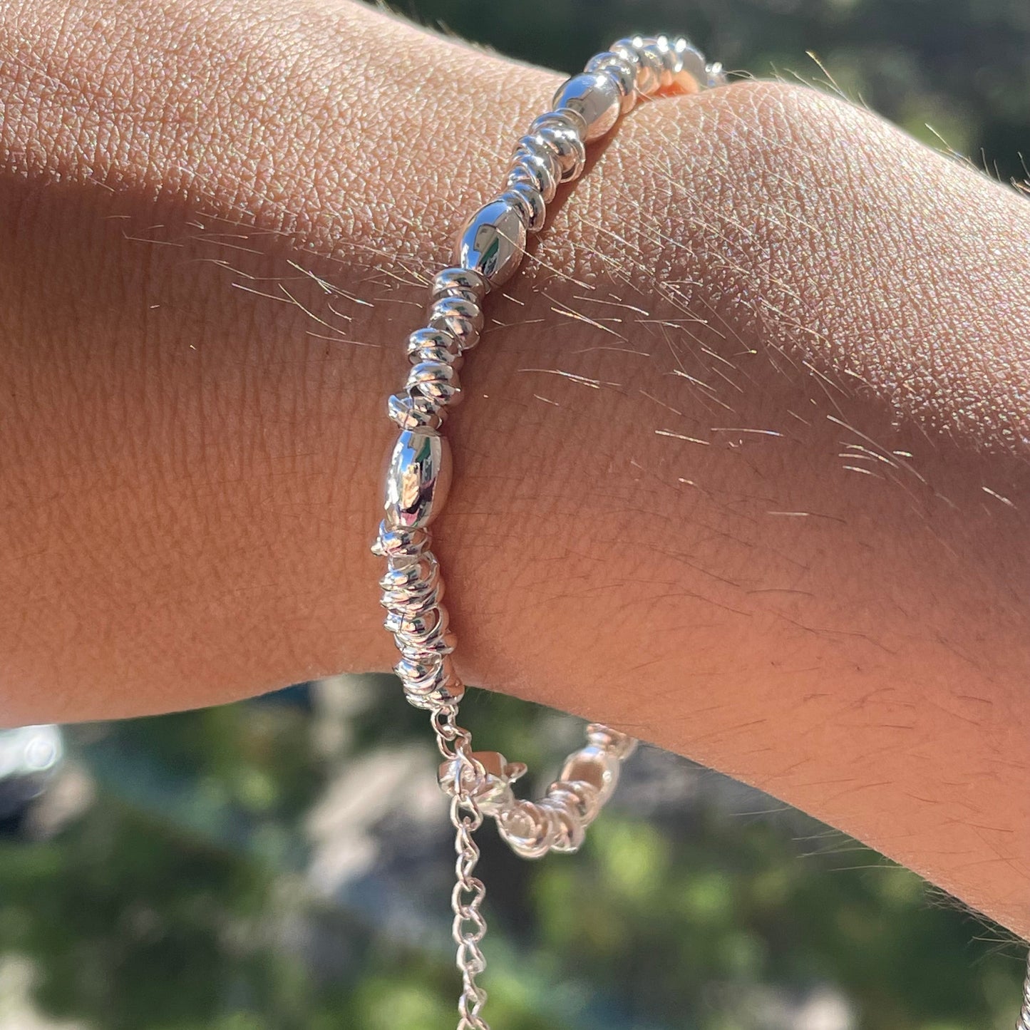 Bracciale perline ovali in 2 colori