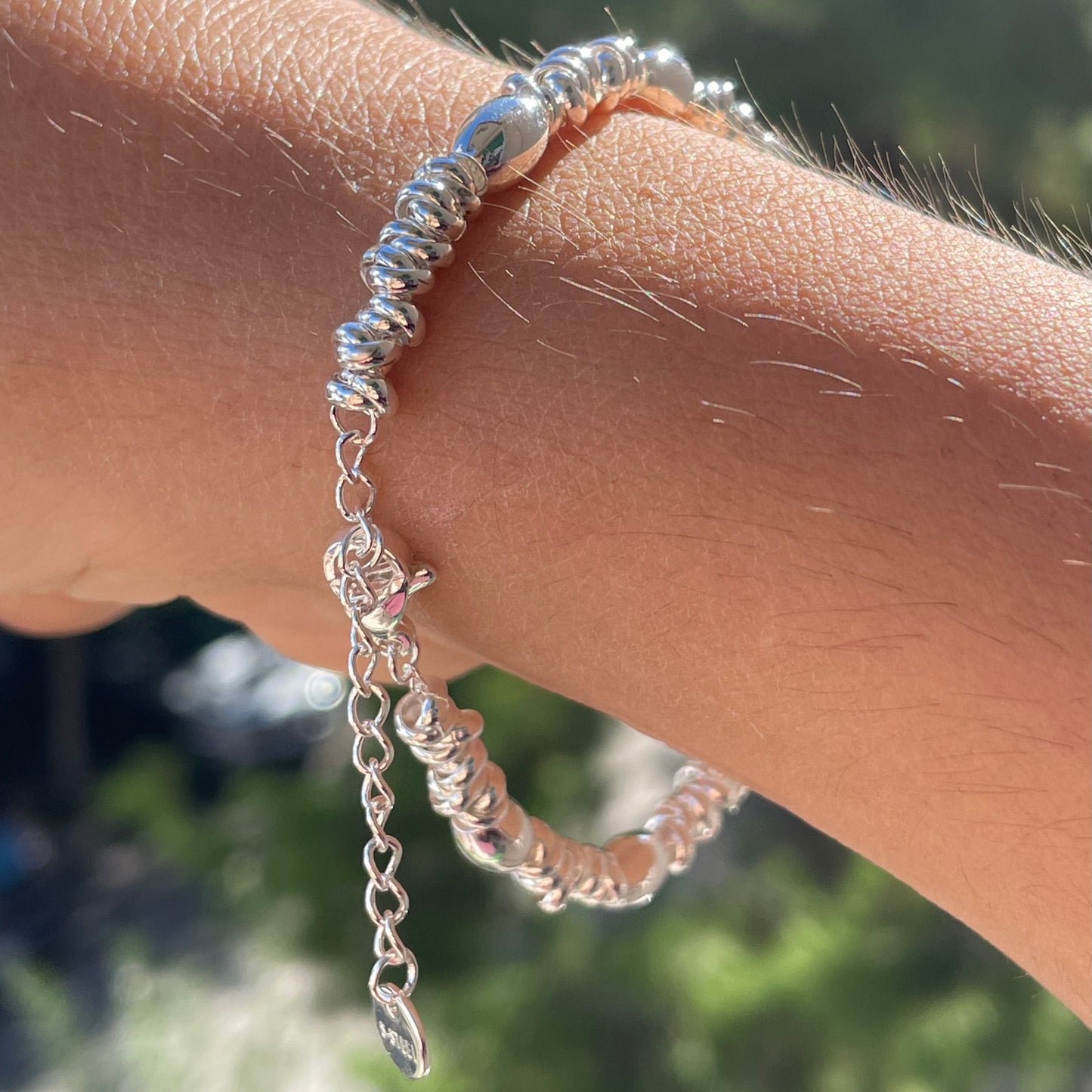 Bracciale perline ovali in 2 colori