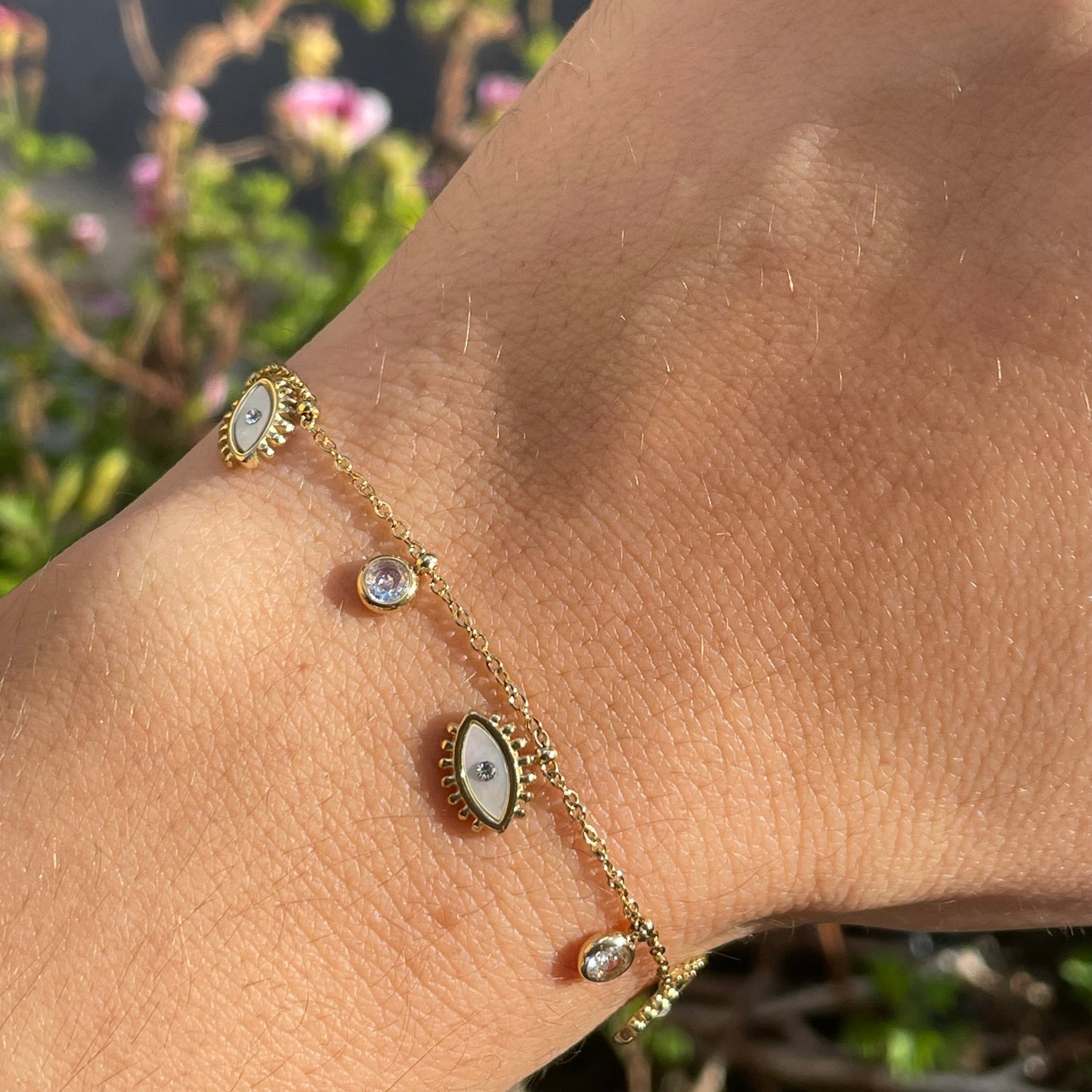 Bracciale occhi perlati