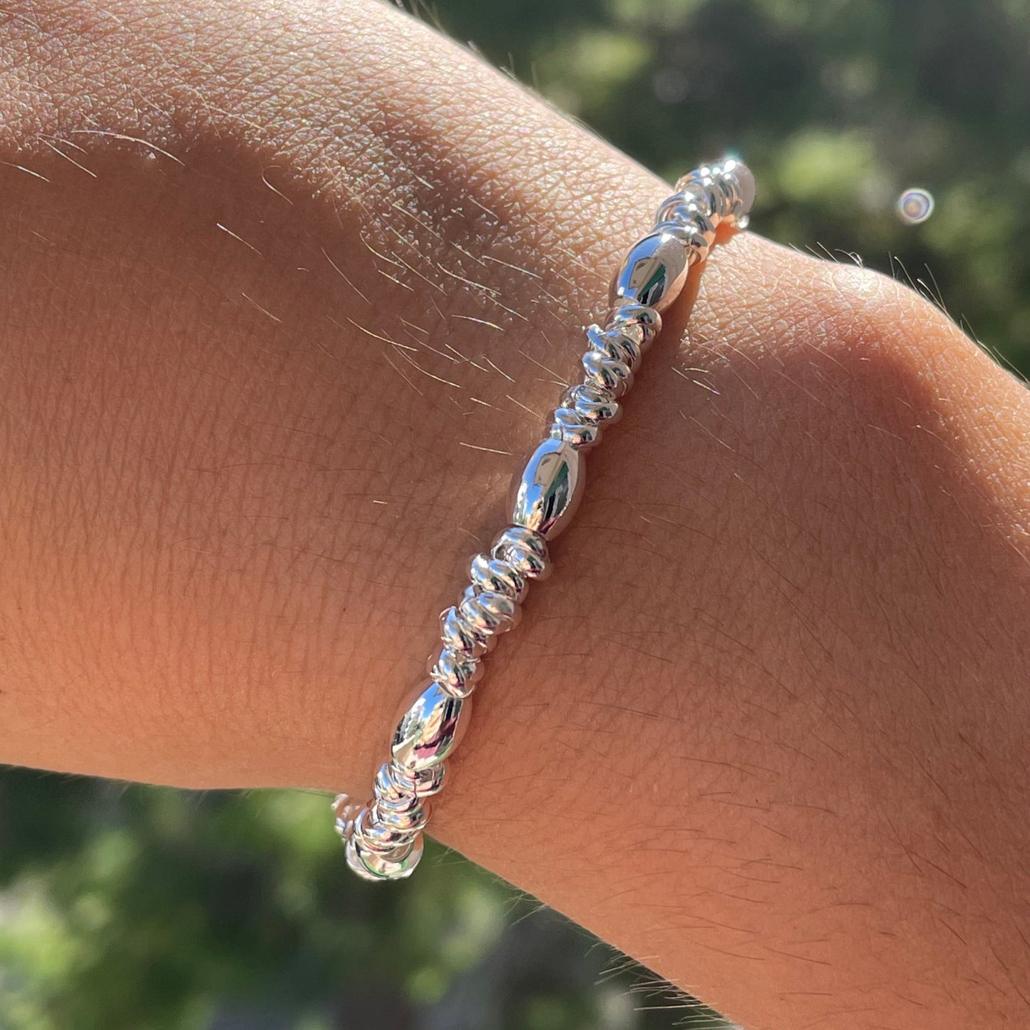 Bracciale perline ovali in 2 colori
