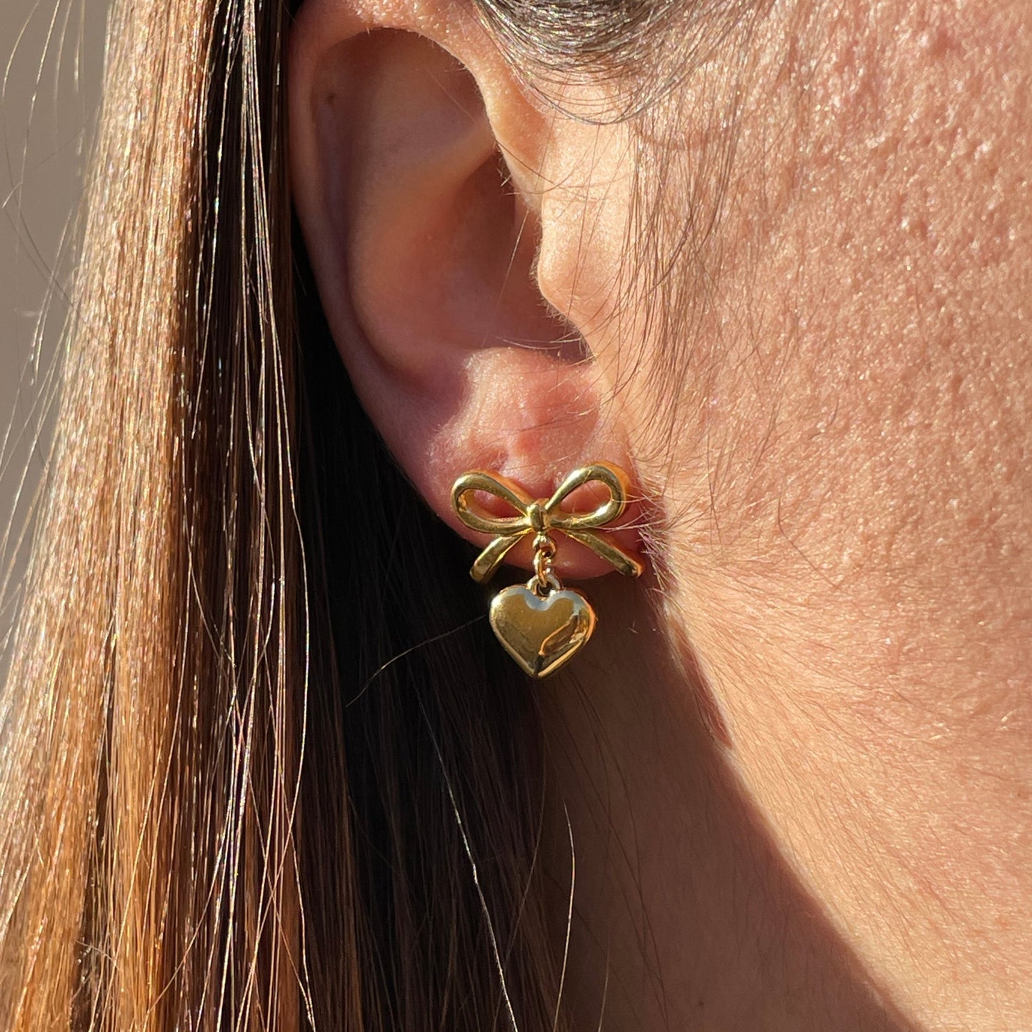 Orecchini fiocco e cuore 2 colori