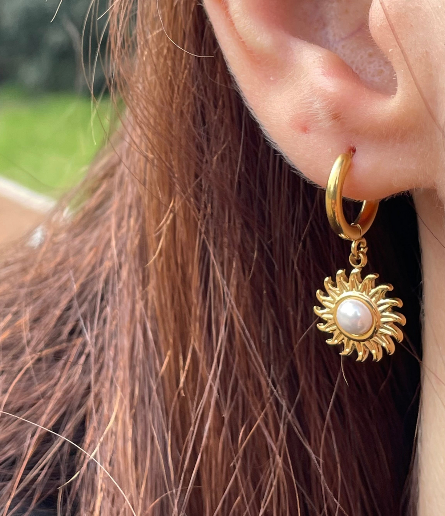 Orecchino sole con perla
