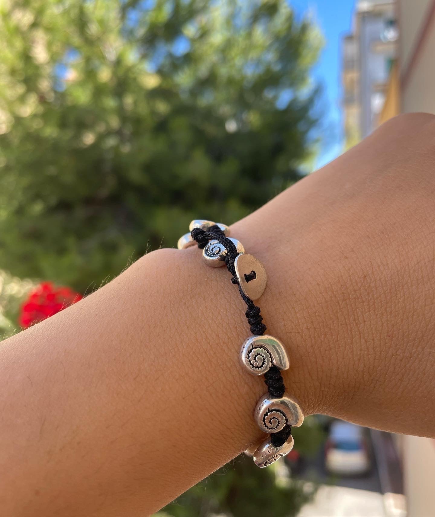 Bracciale con charm in 5 fantasie
