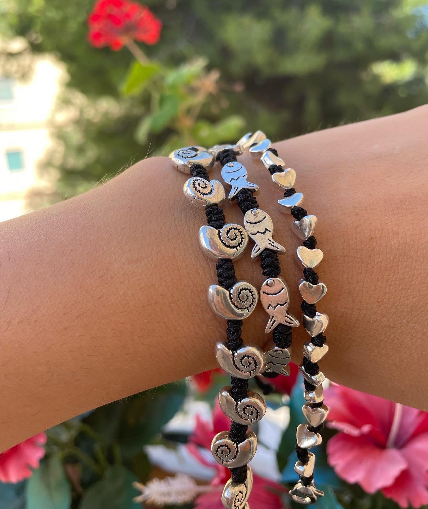 Bracciale con charm in 5 fantasie