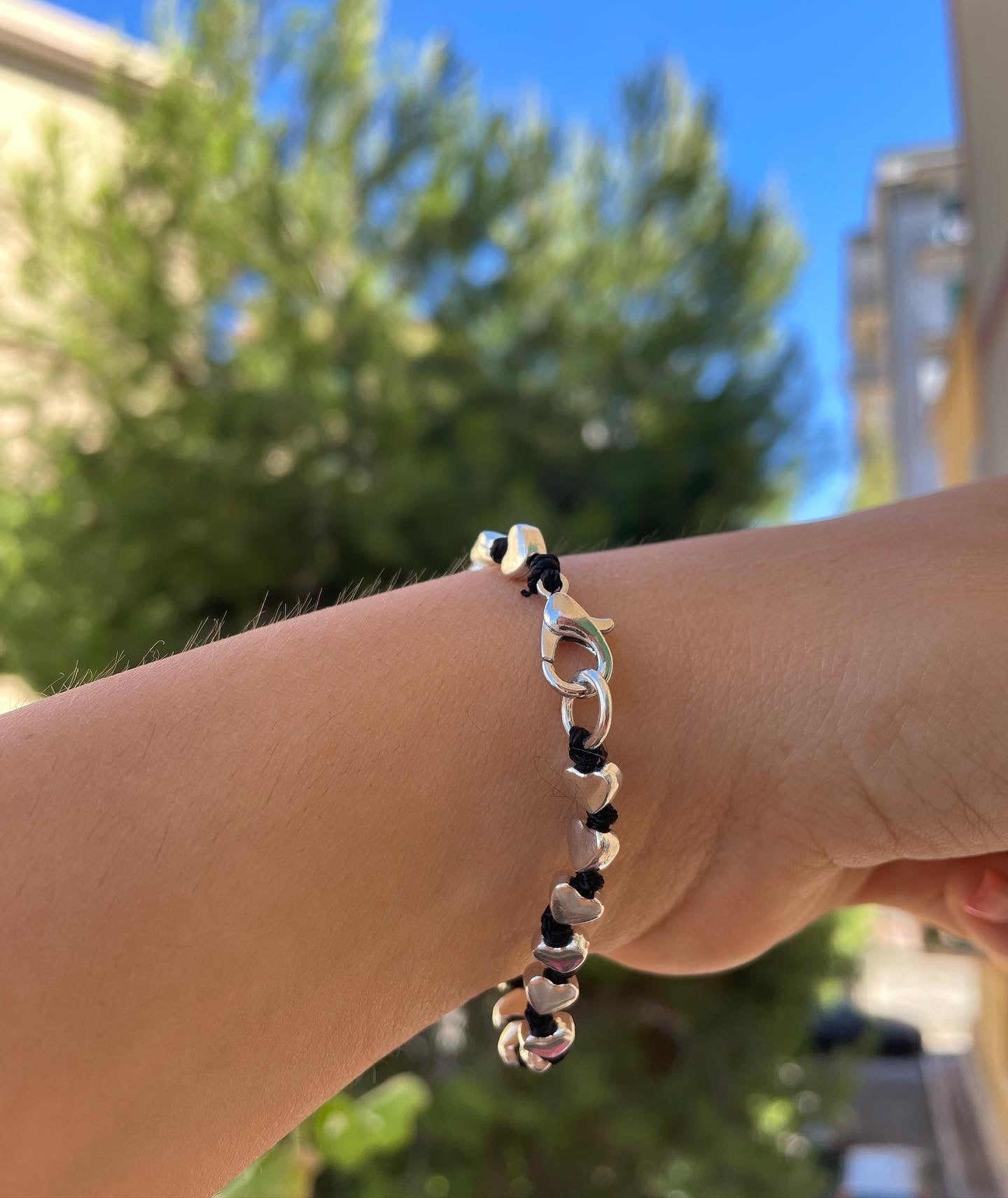 Bracciale con charm in 5 fantasie