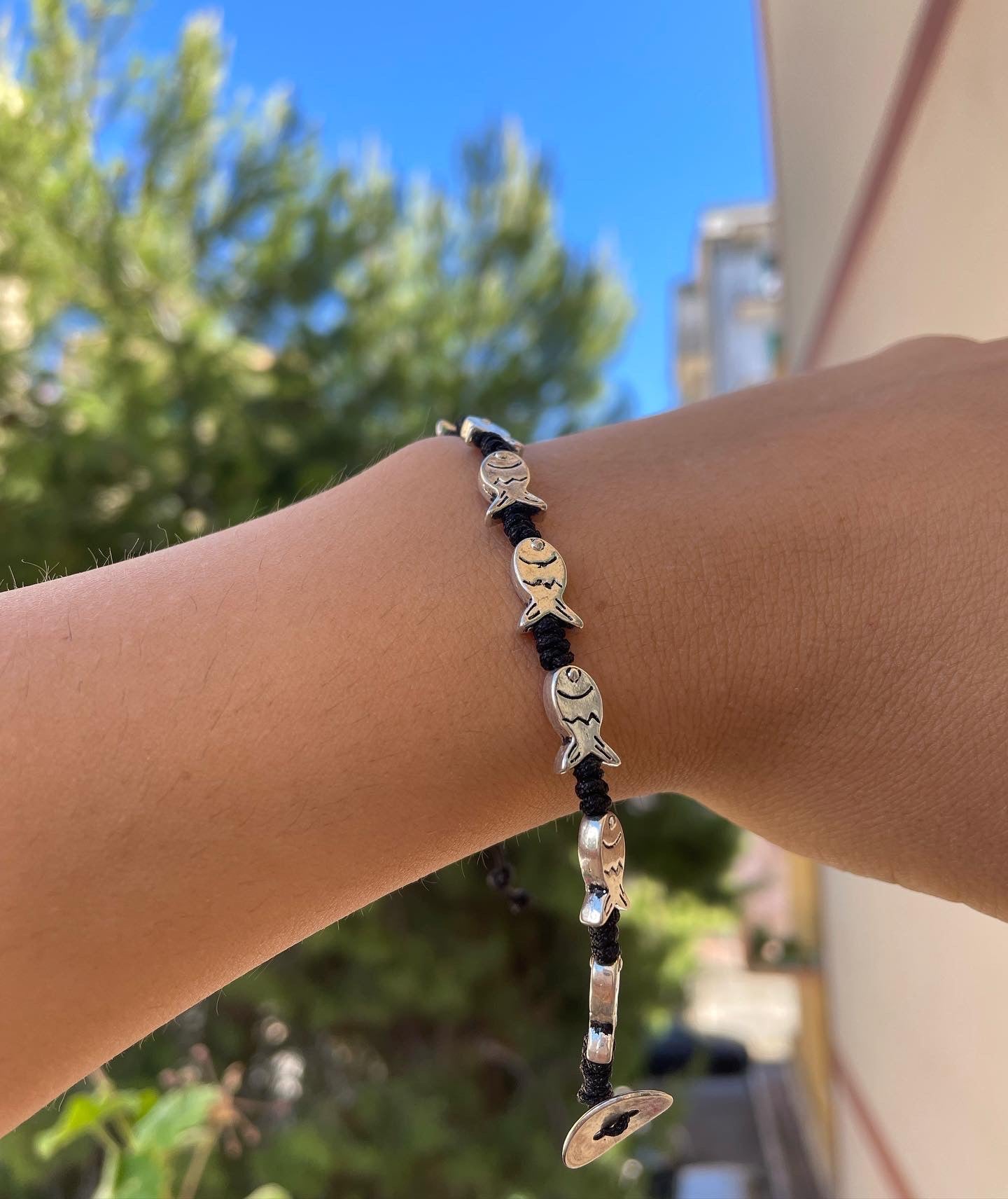 Bracciale con charm in 5 fantasie