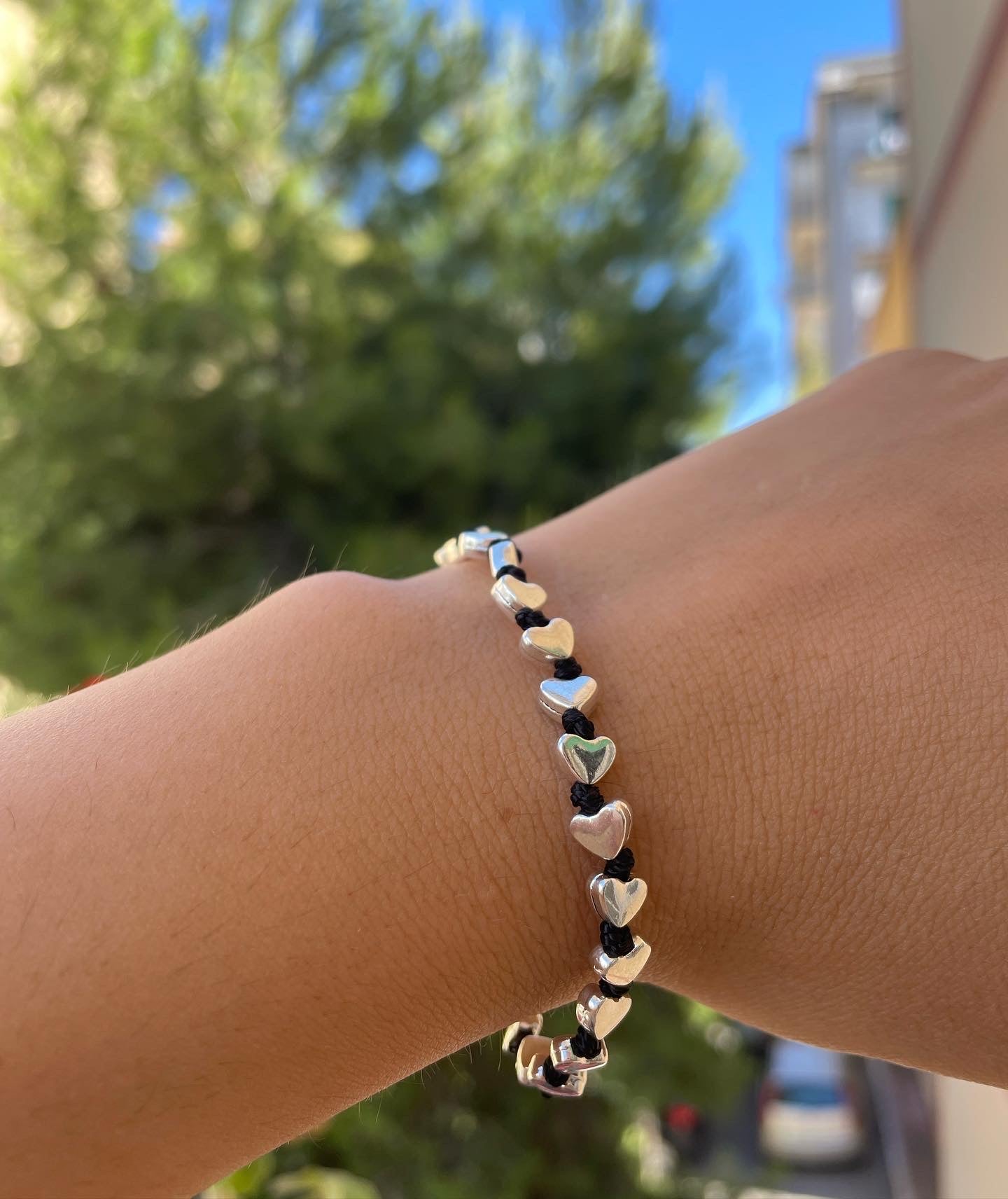 Bracciale con charm in 5 fantasie