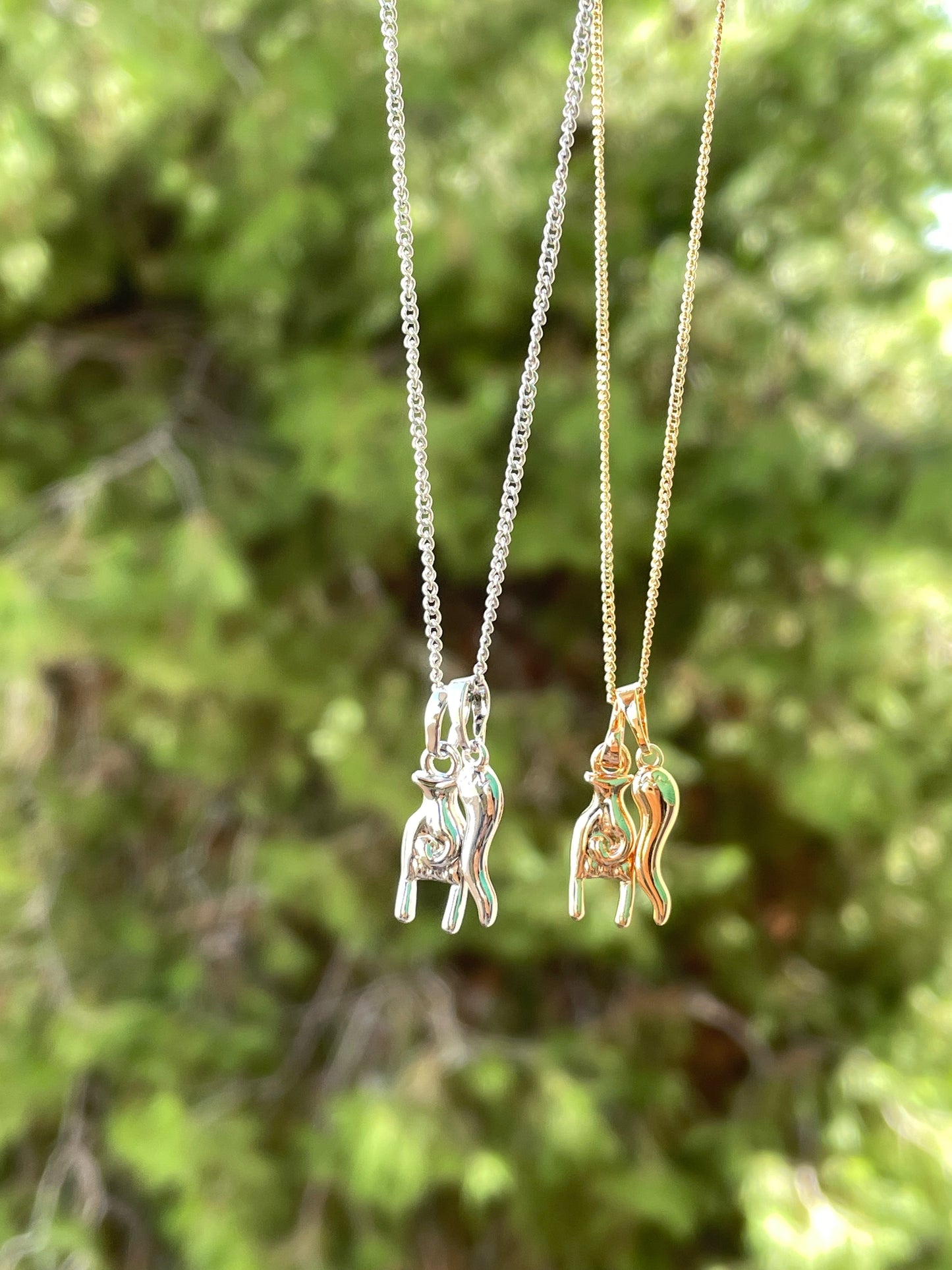 Collana con corna e corno in 2 colori
