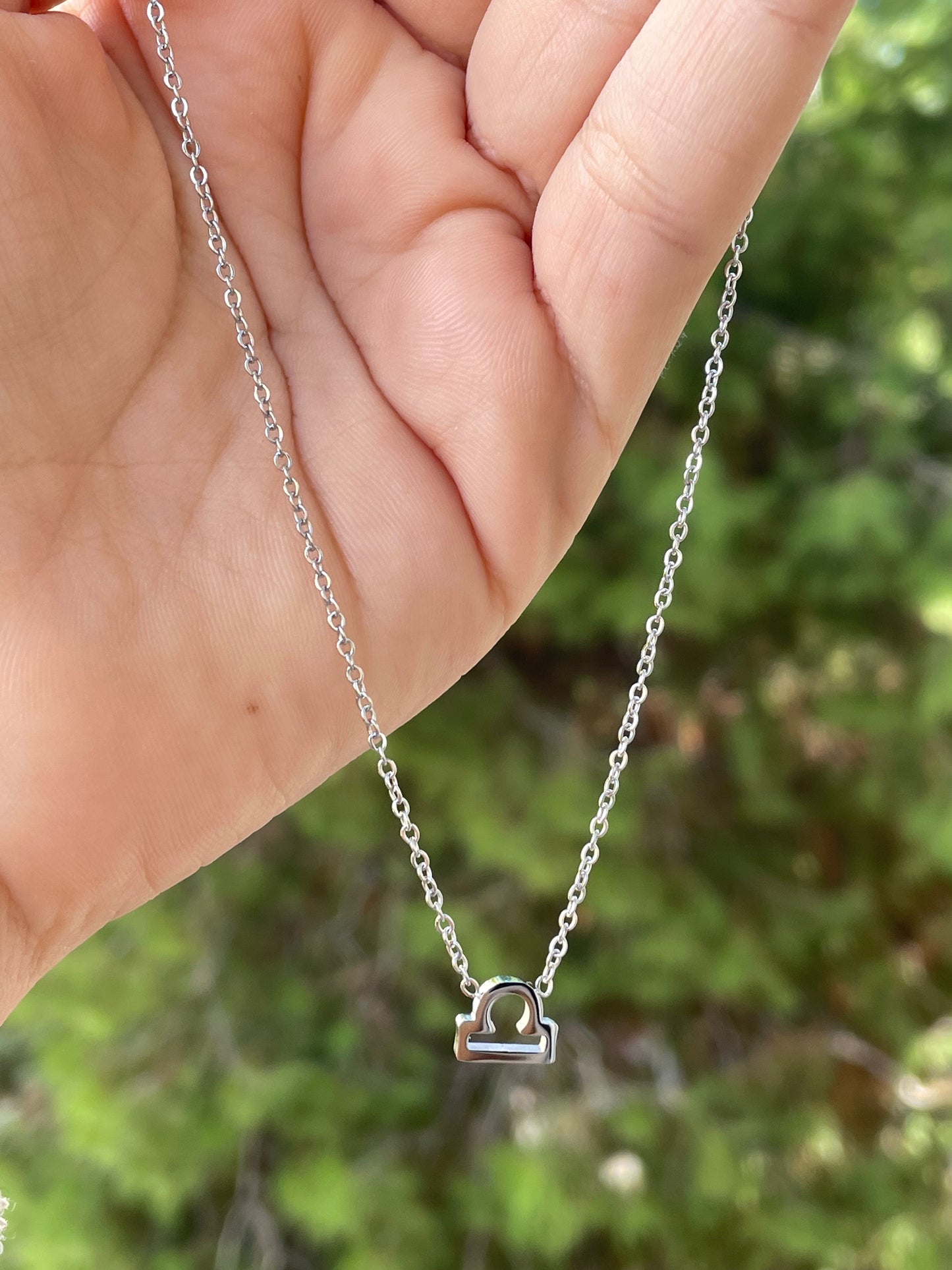 Collana con segno zodiacale in 2 colori