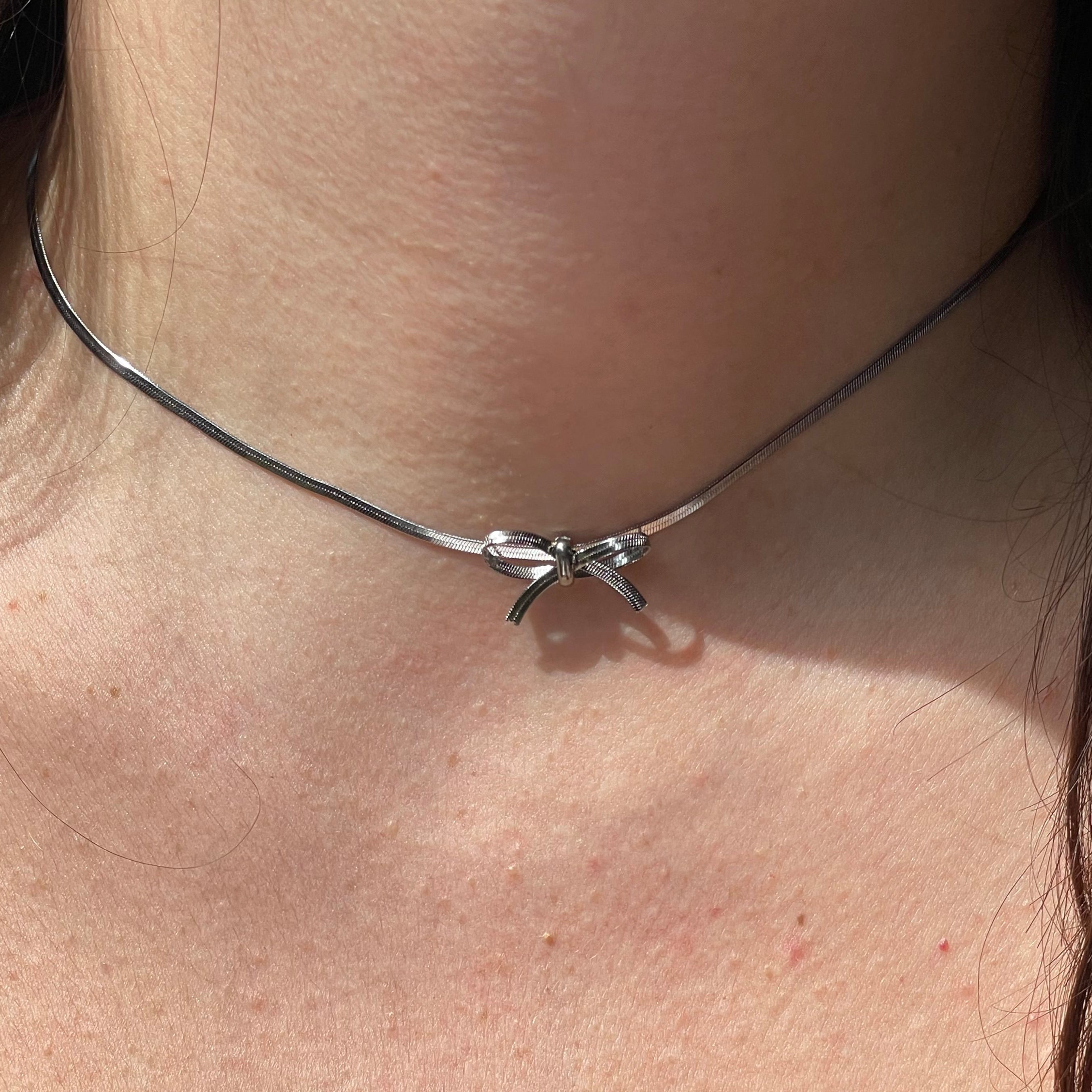 Collana fiocchetto in 2 colori