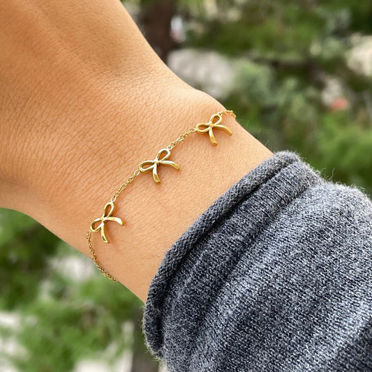 Bracciale tre fiocchetti in 2 colori