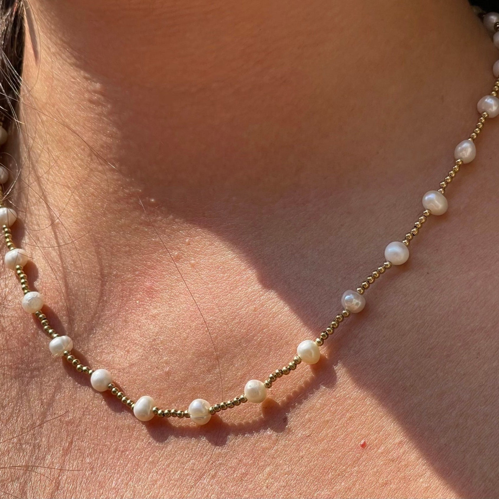 Collana con perle luminose