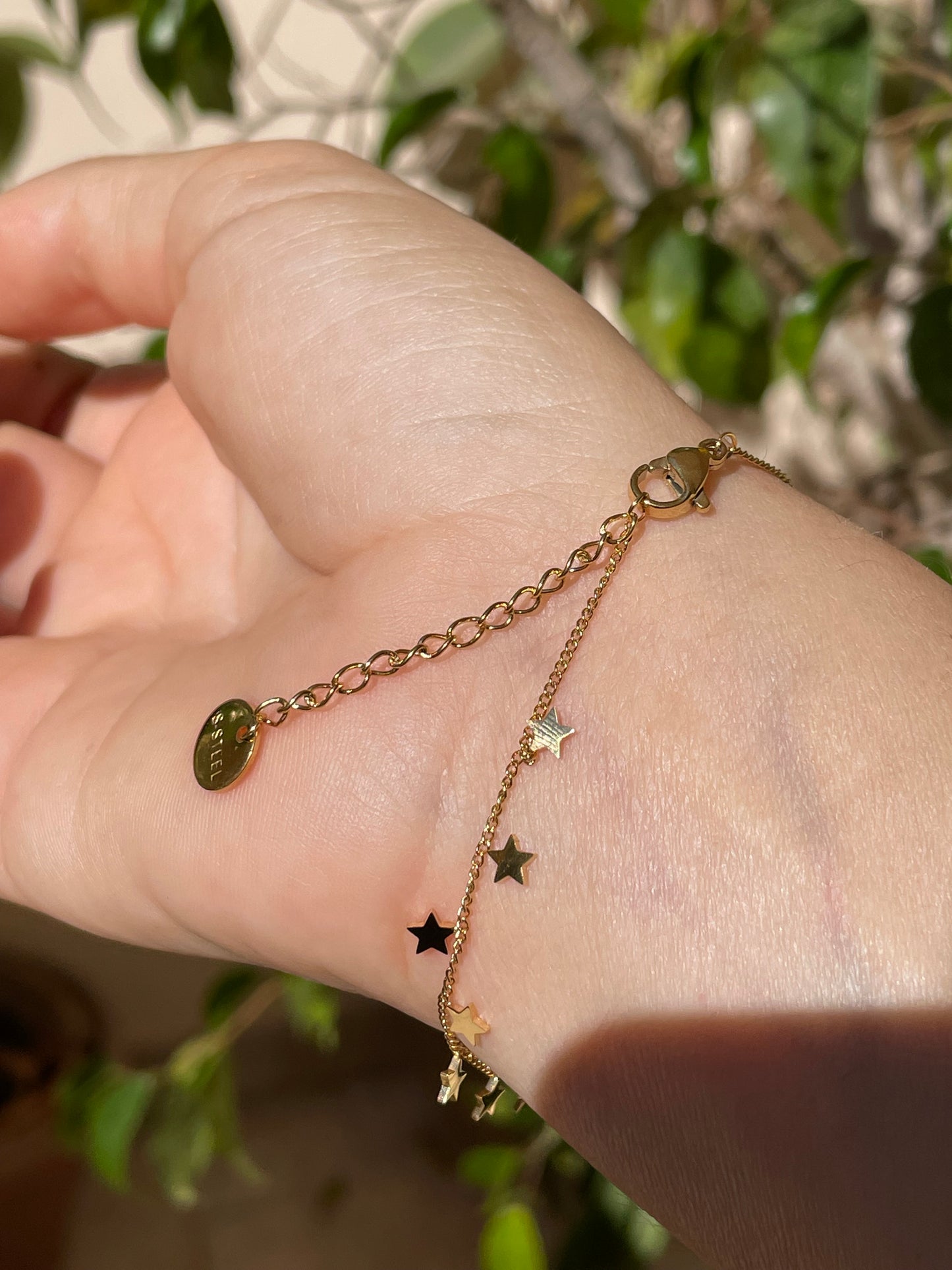 Bracciale con stelline in 2 colori