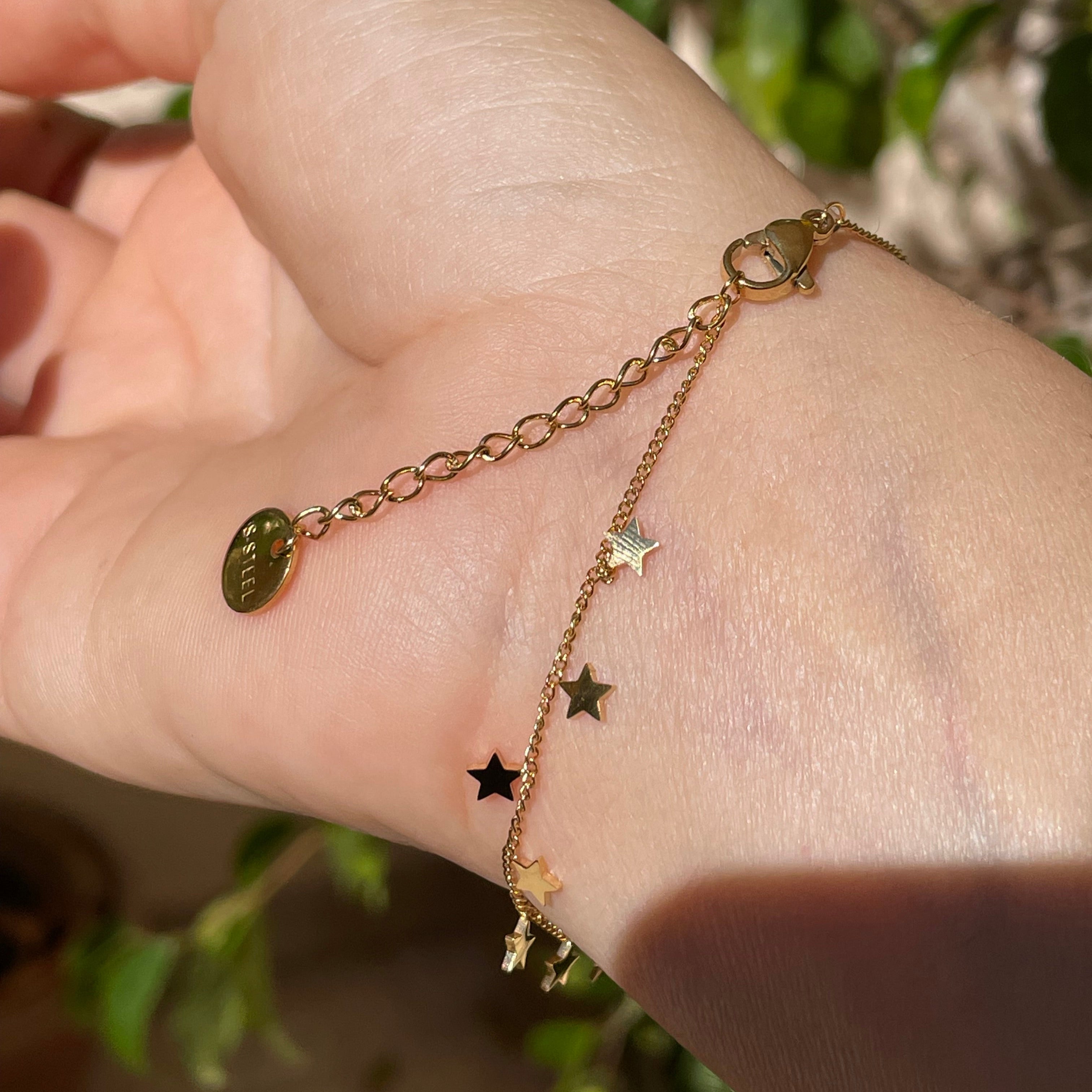 Bracciale con stelline in 2 colori