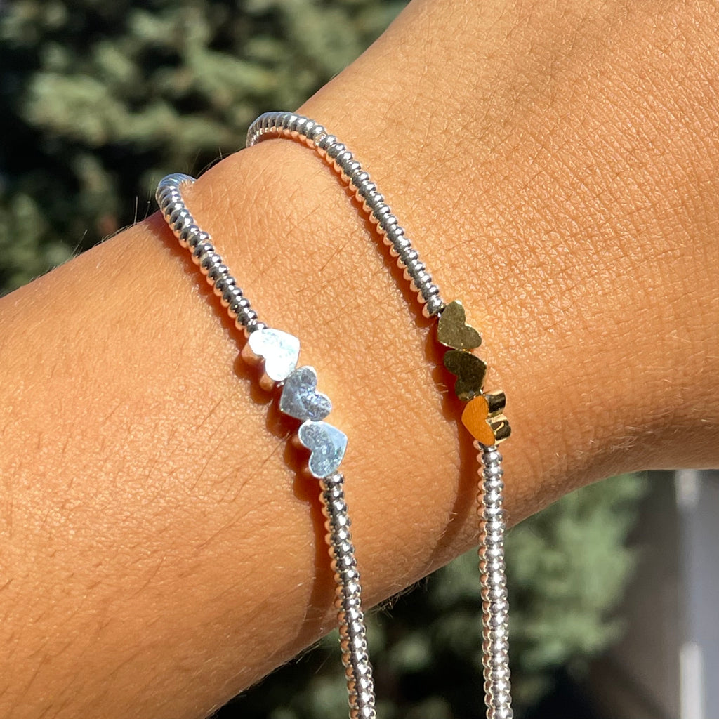 Bracciale tre cuori in 2 colori