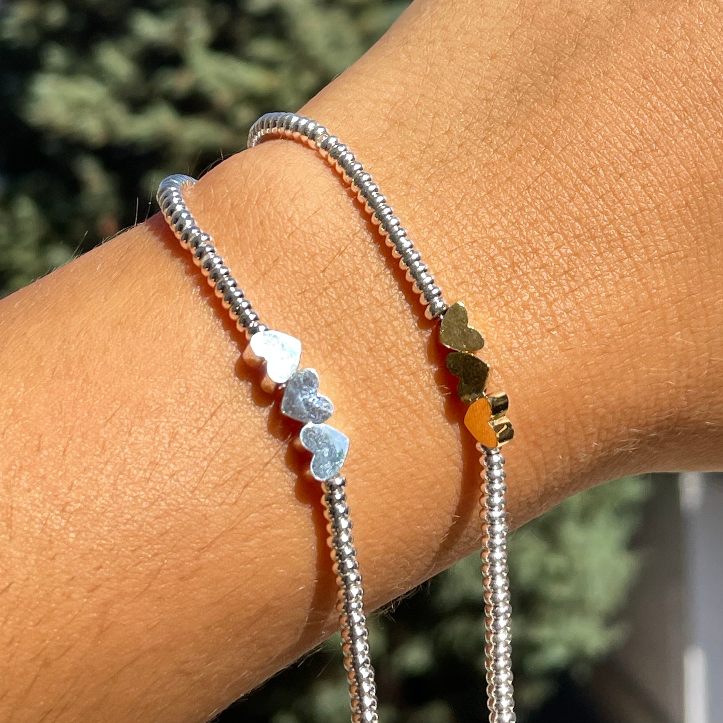 Bracciale tre cuori in 2 colori