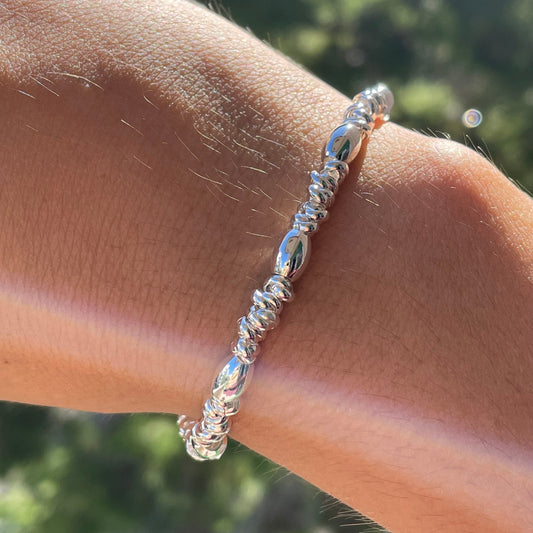 Bracciale perline ovali in 2 colori