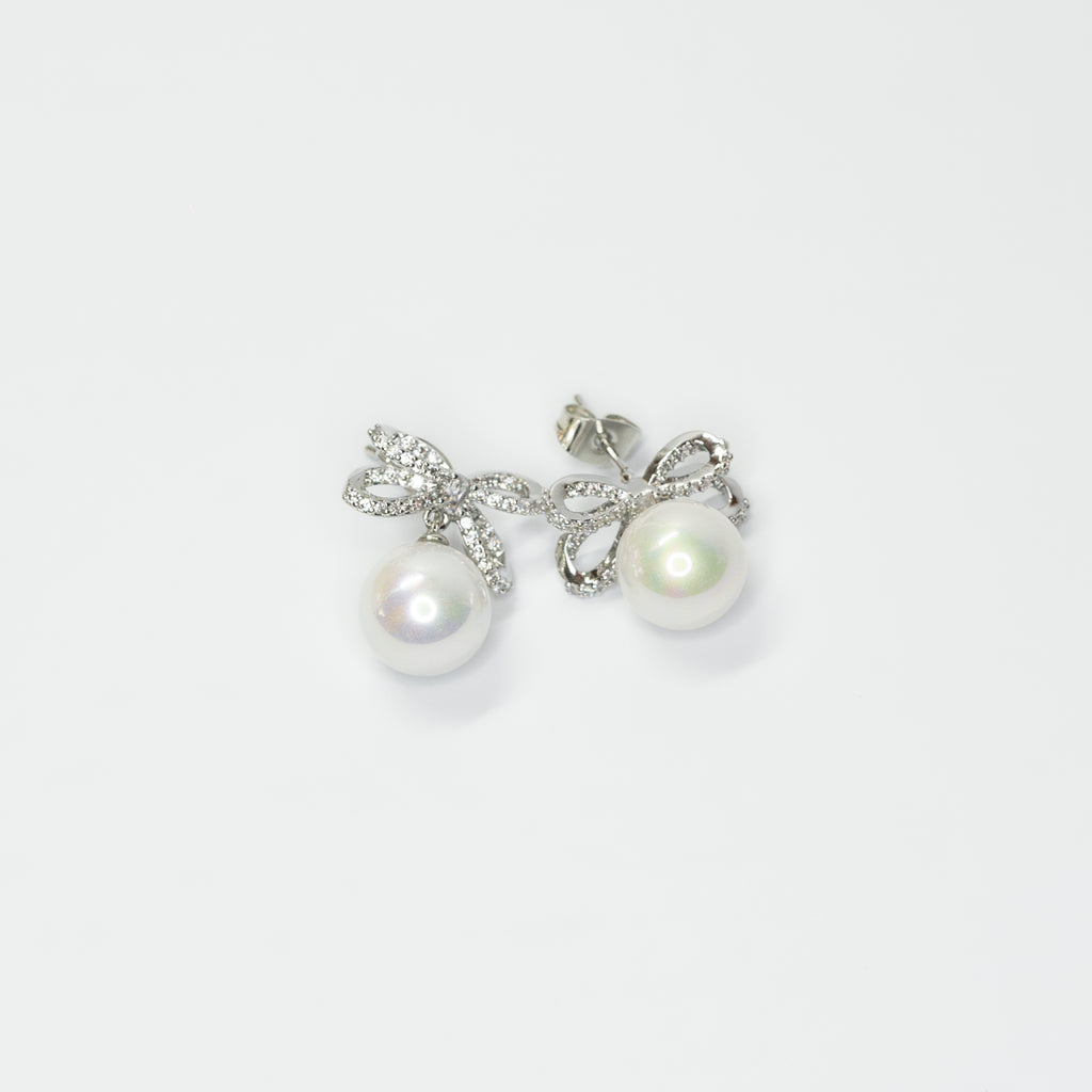 Orecchini fiocco di perla in 2 colori