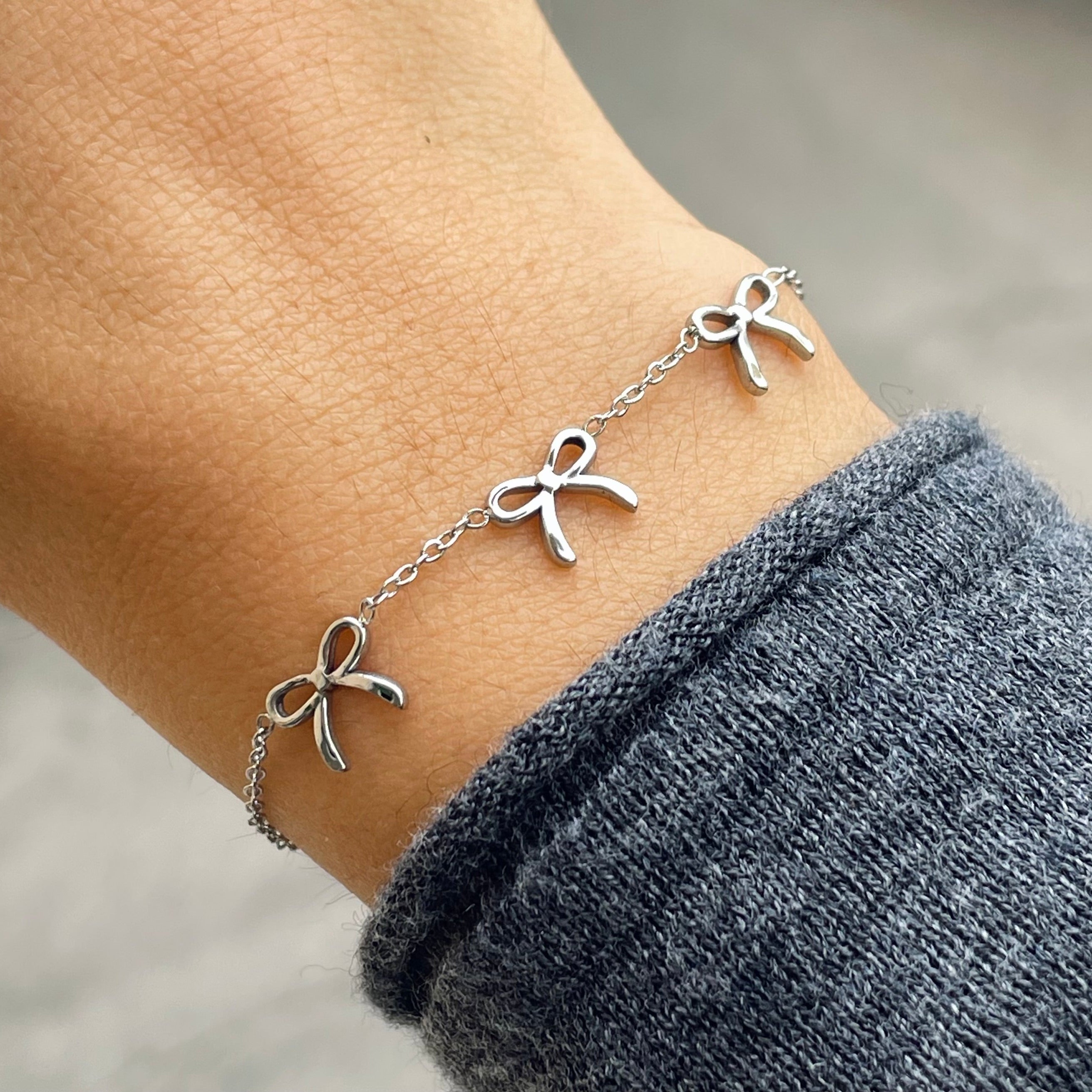Bracciale tre fiocchetti in 2 colori