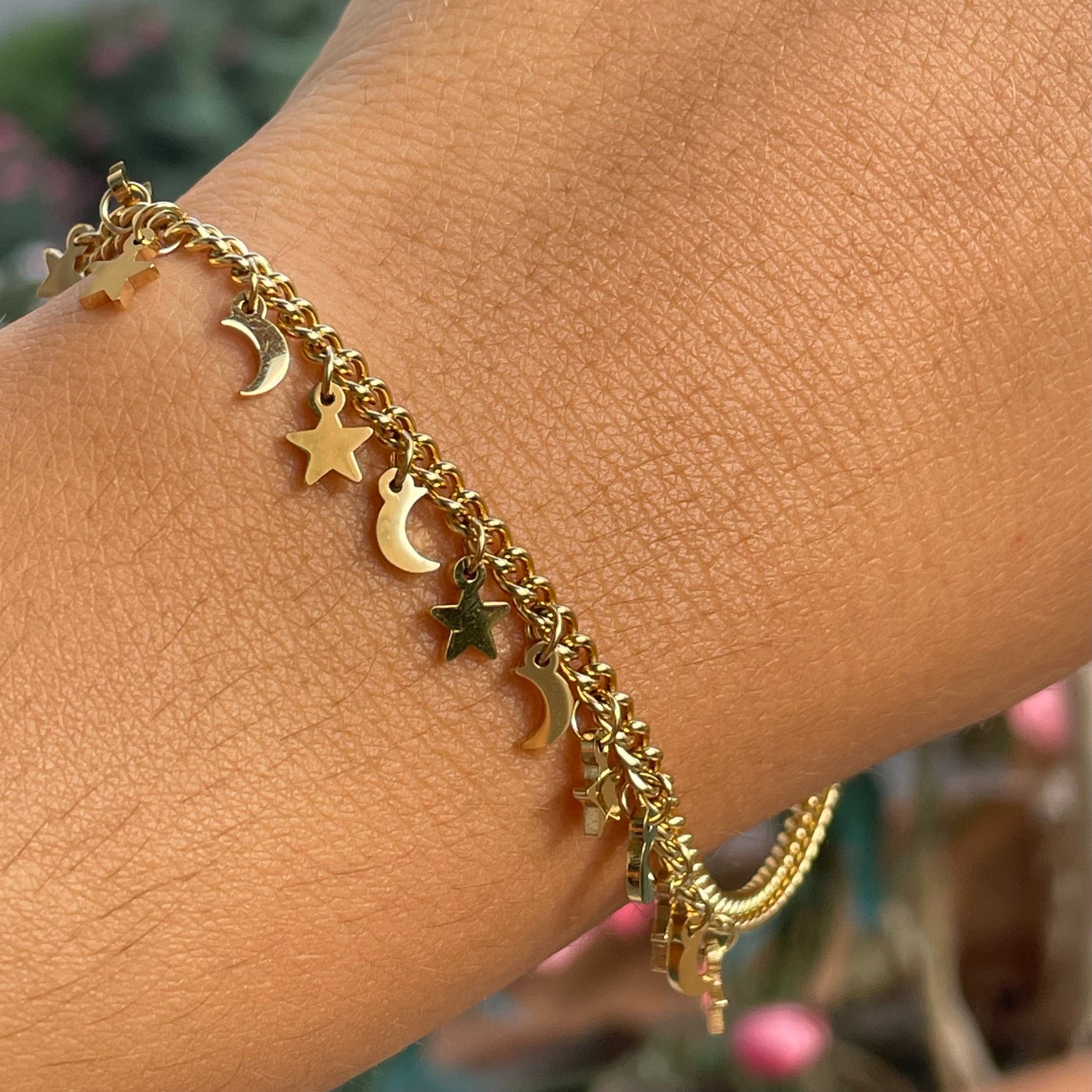 Bracciale con stelle e lune in 2 colori