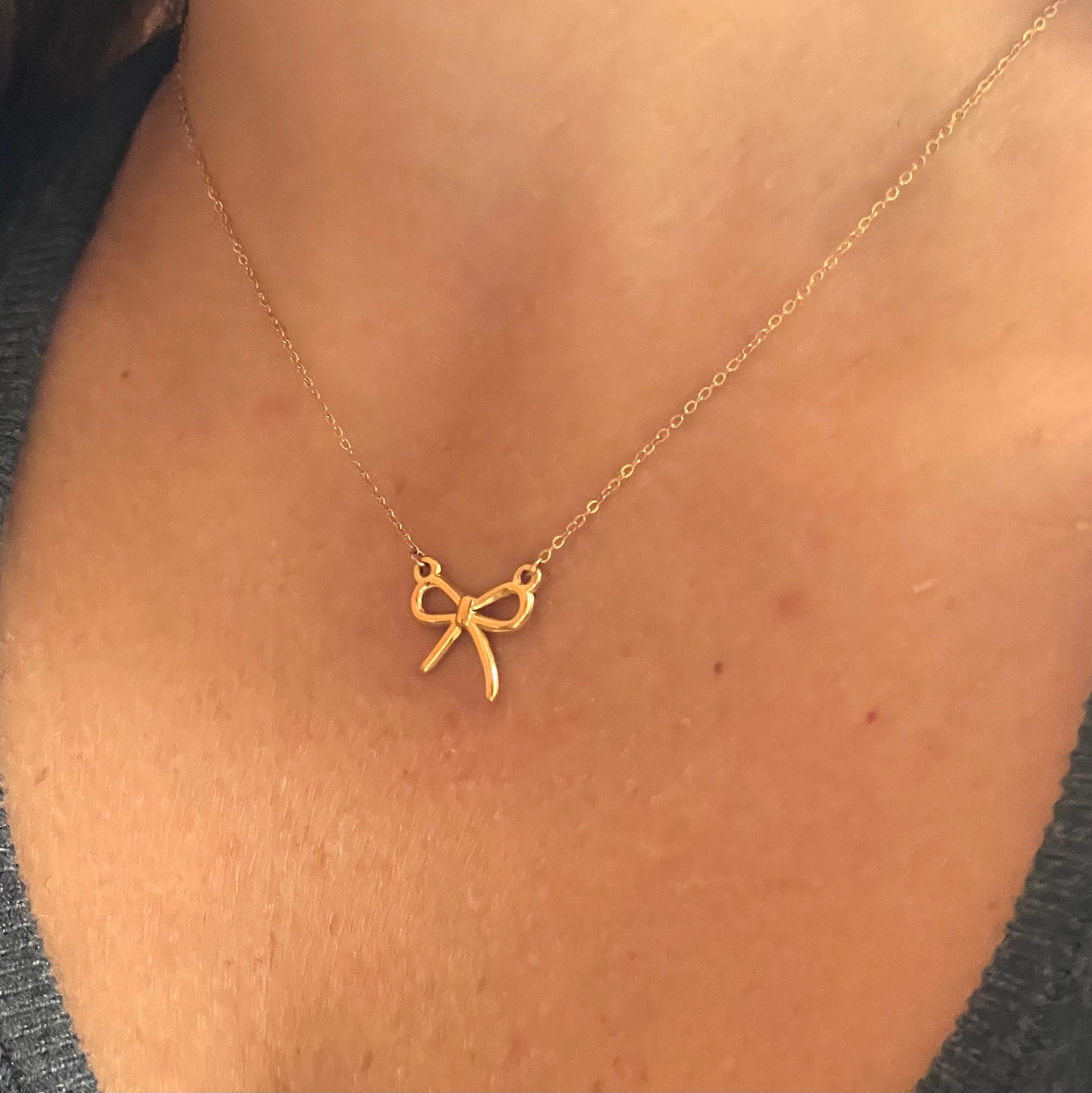 Collana fiocco luminoso in 2 colori