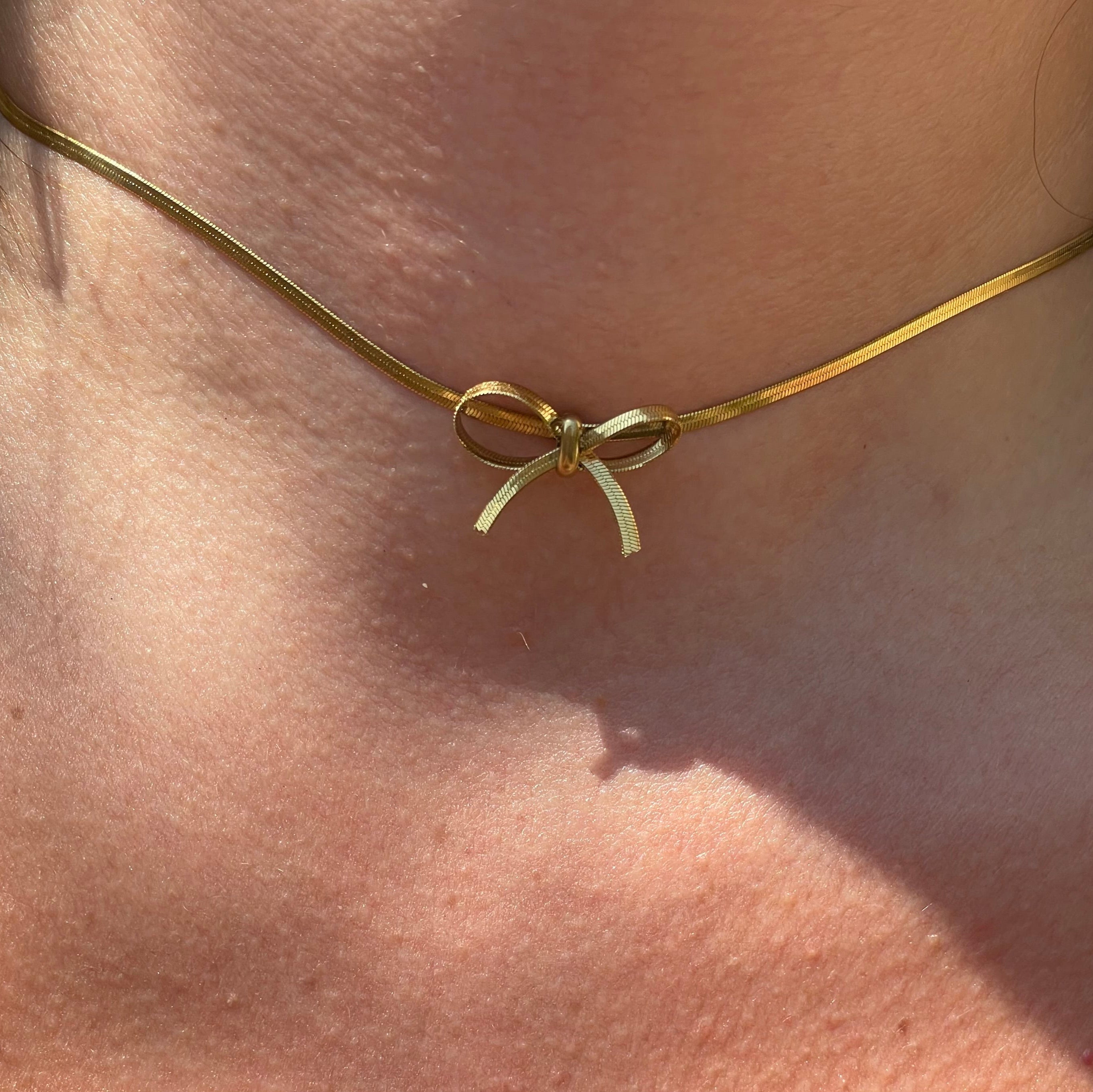 Collana fiocchetto in 2 colori