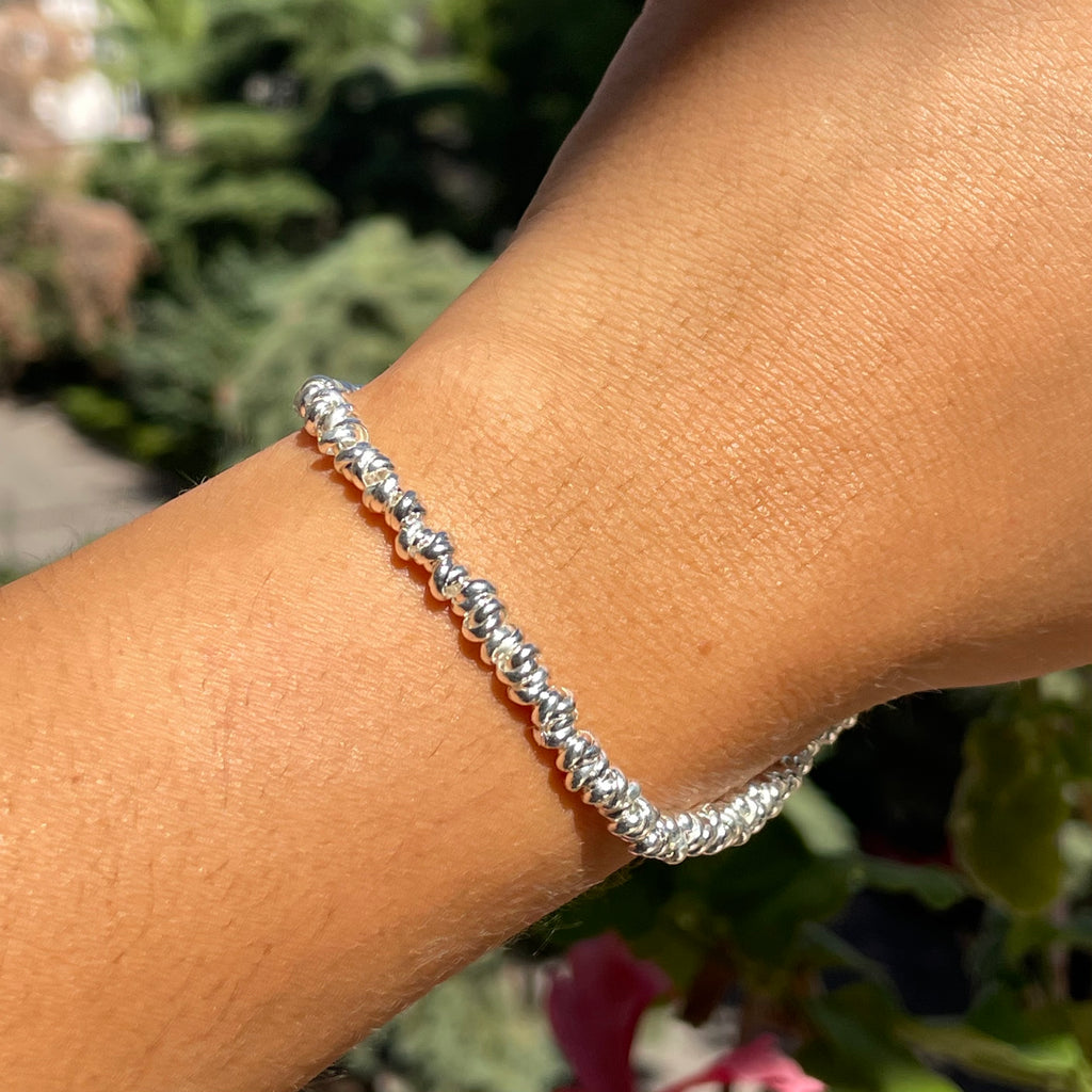 Bracciale dischetti in 3 colori