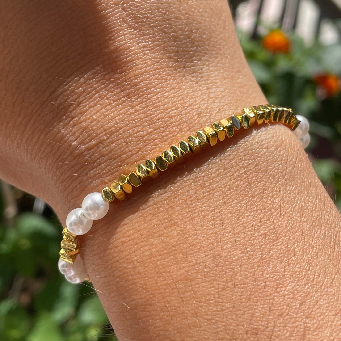 Bracciale con perle e quadratini