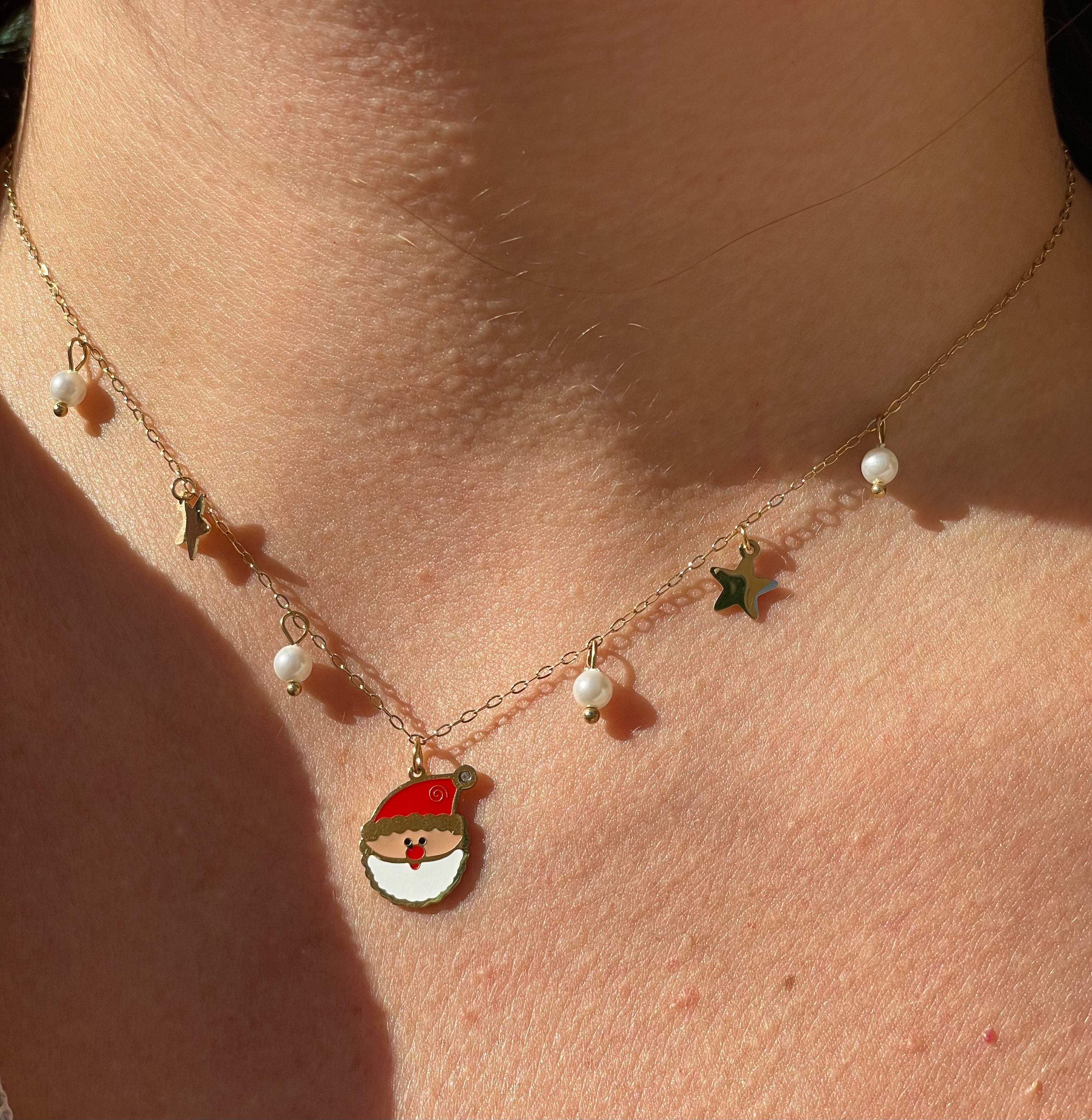 Collana con perle, stelle e babbo Natale