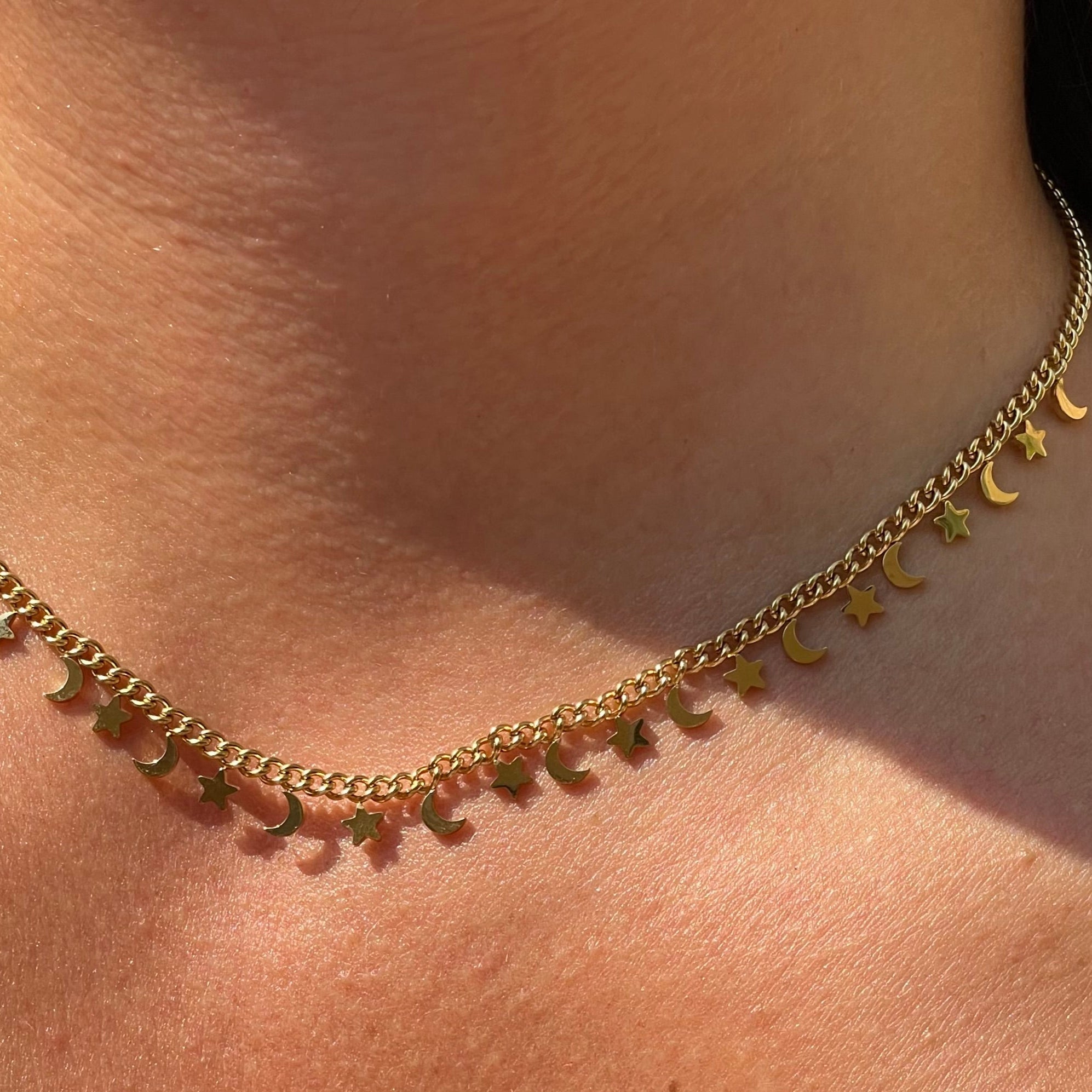 Collana con stelle e lune in 2 colori