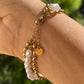 Bracciale di perle ovali in 2 colori