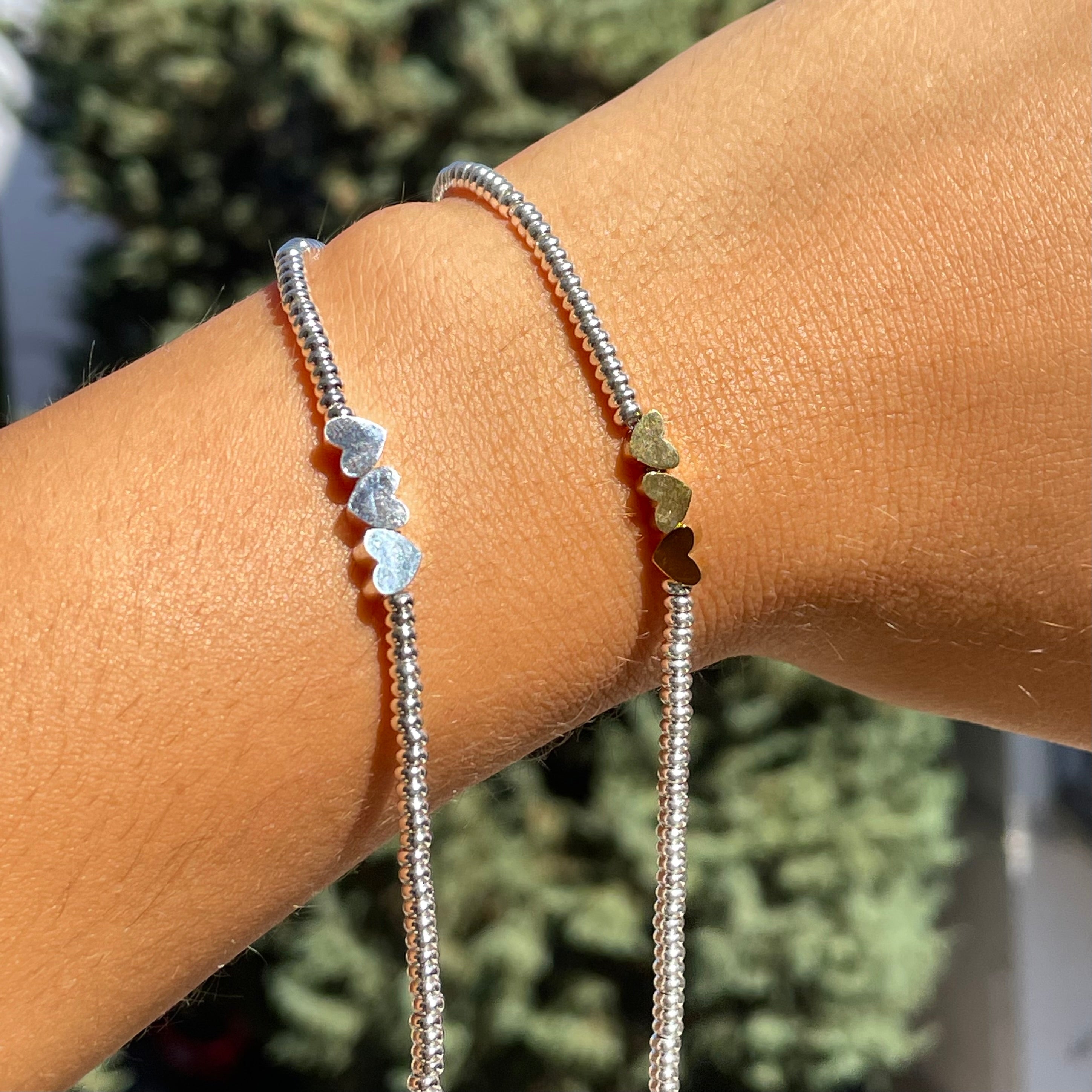 Bracciale tre cuori in 2 colori