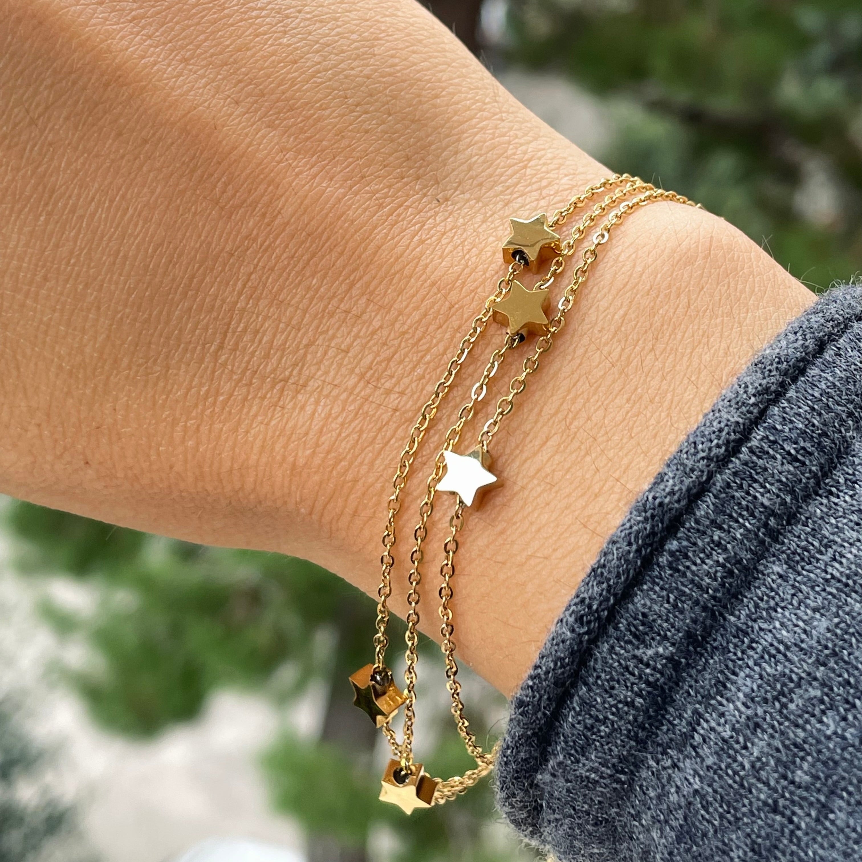 Bracciale stelline a tre fili in 2 colori