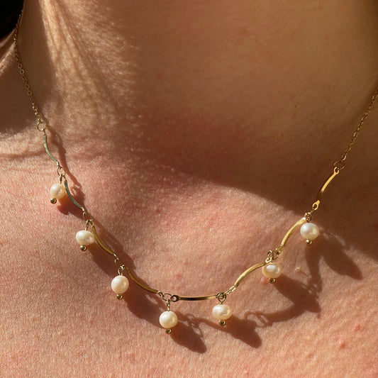 Collana con perle pendenti