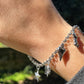 Bracciale charm sonagli in 2 colori