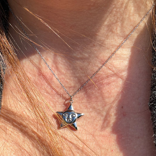 Collana stella con viso in 2 colori