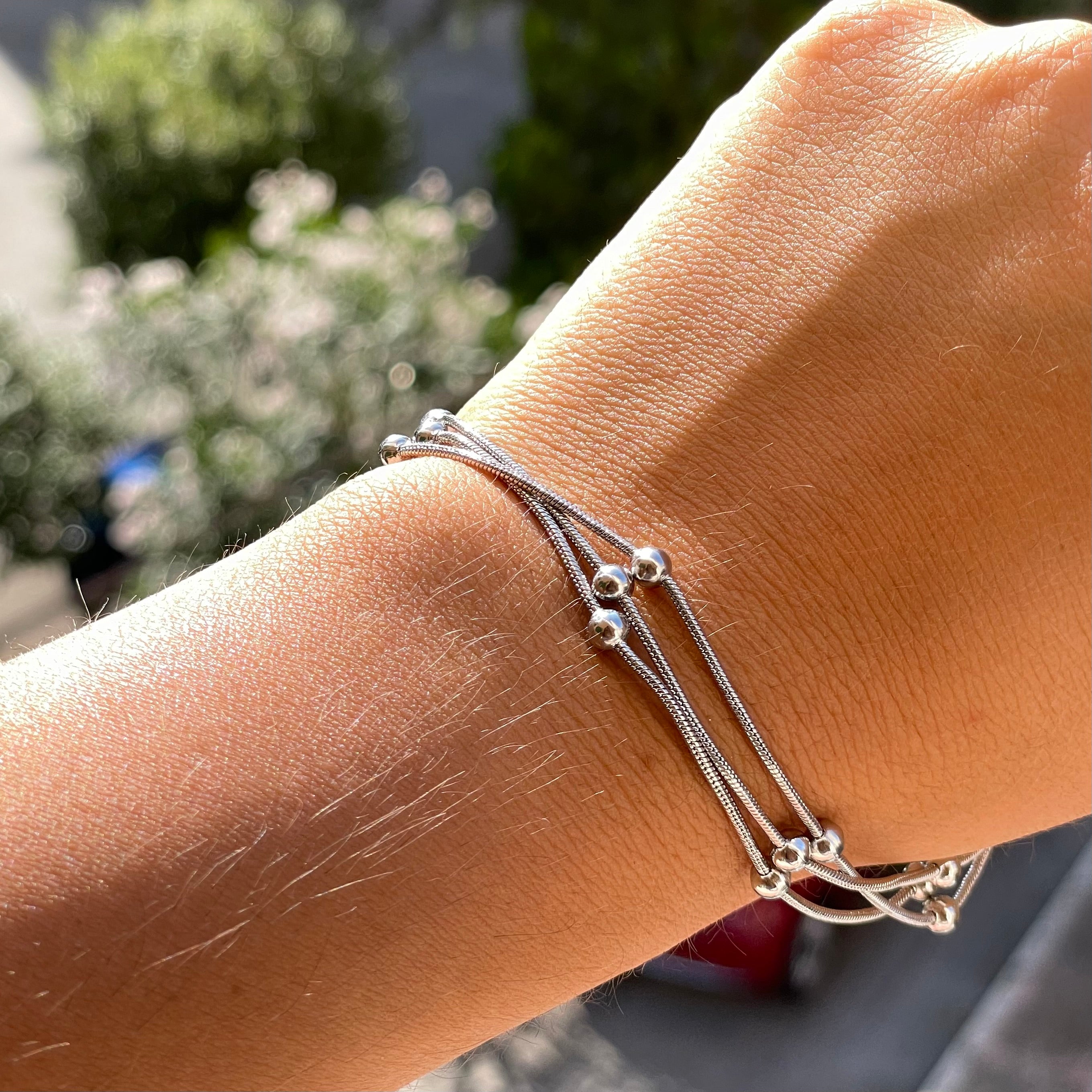 Bracciale pallini a tre in 2 colori