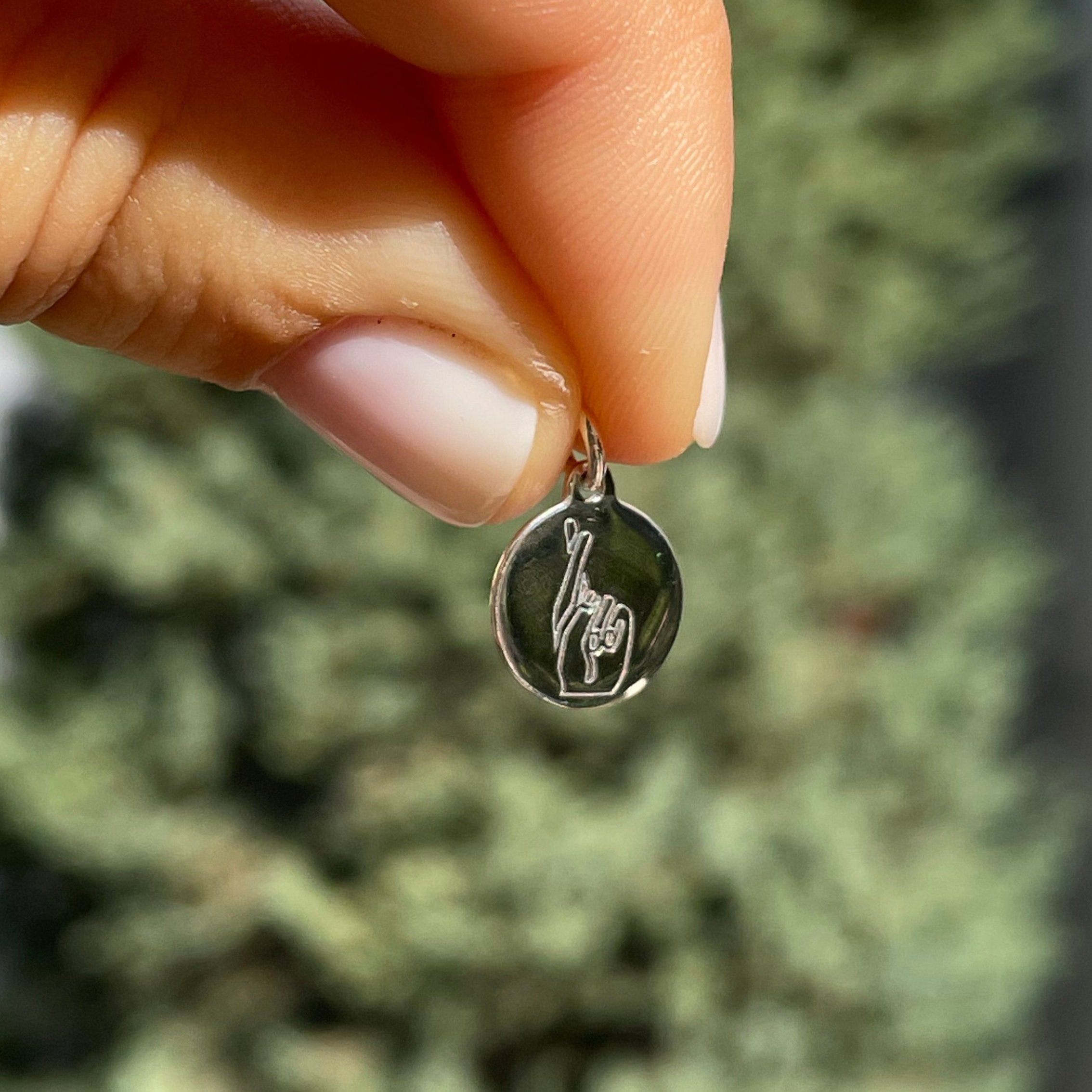Charm Dita incrociate di Buona Fortuna