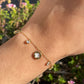 Bracciale quadrifogli incastonati perlati