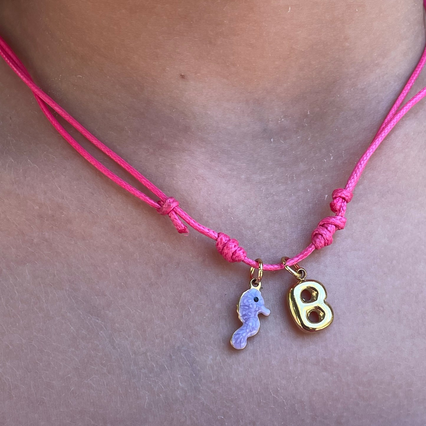 Charm cavalluccio marino lilla