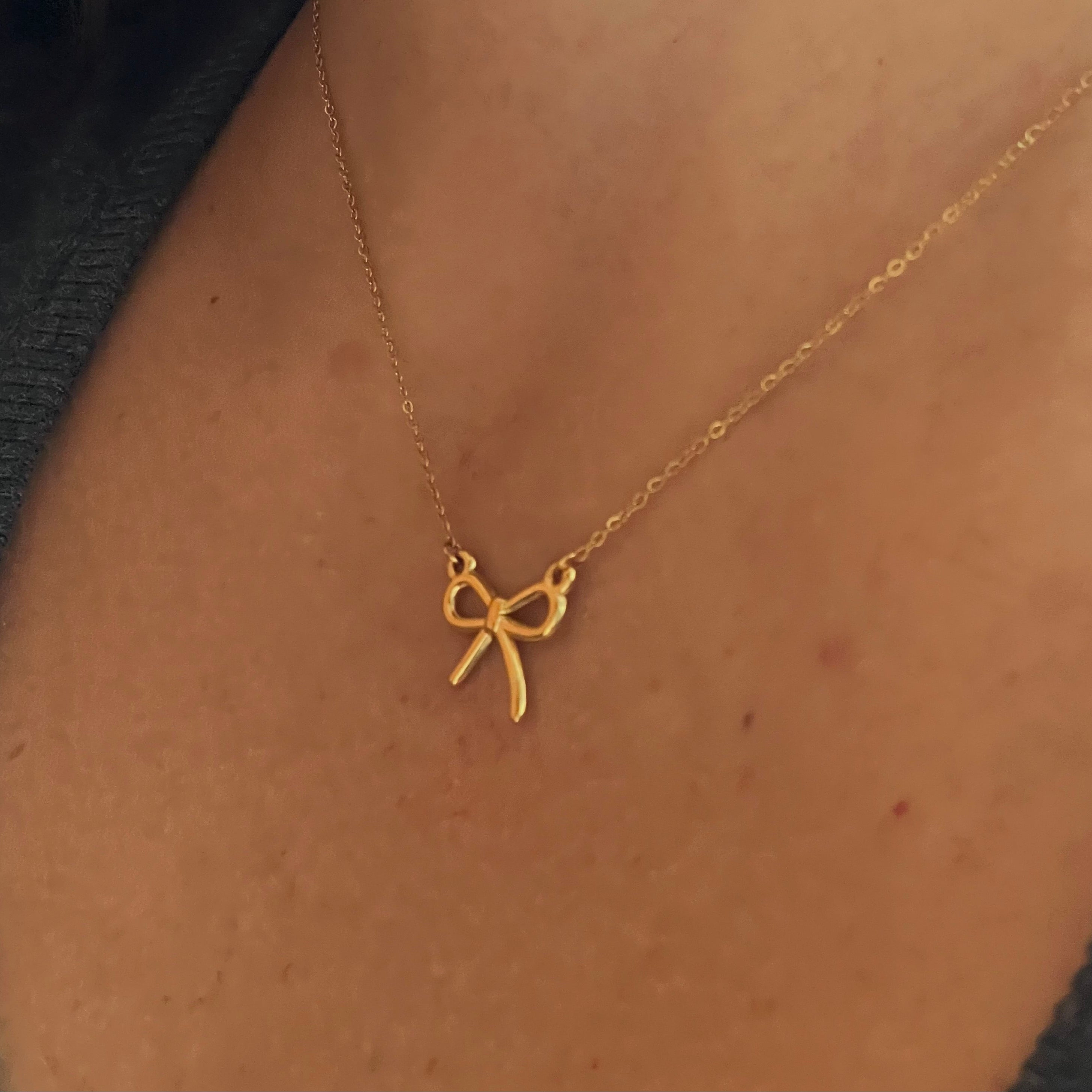 Collana fiocco luminoso in 2 colori