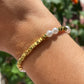 Bracciale con perle e quadratini