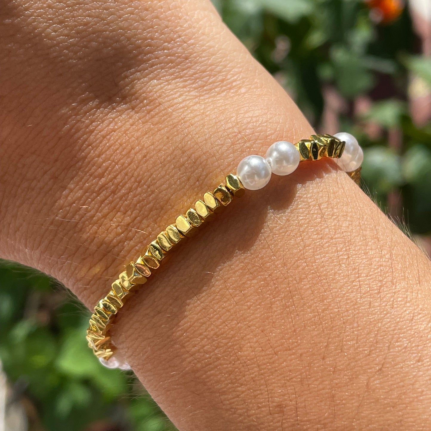Bracciale con perle e quadratini