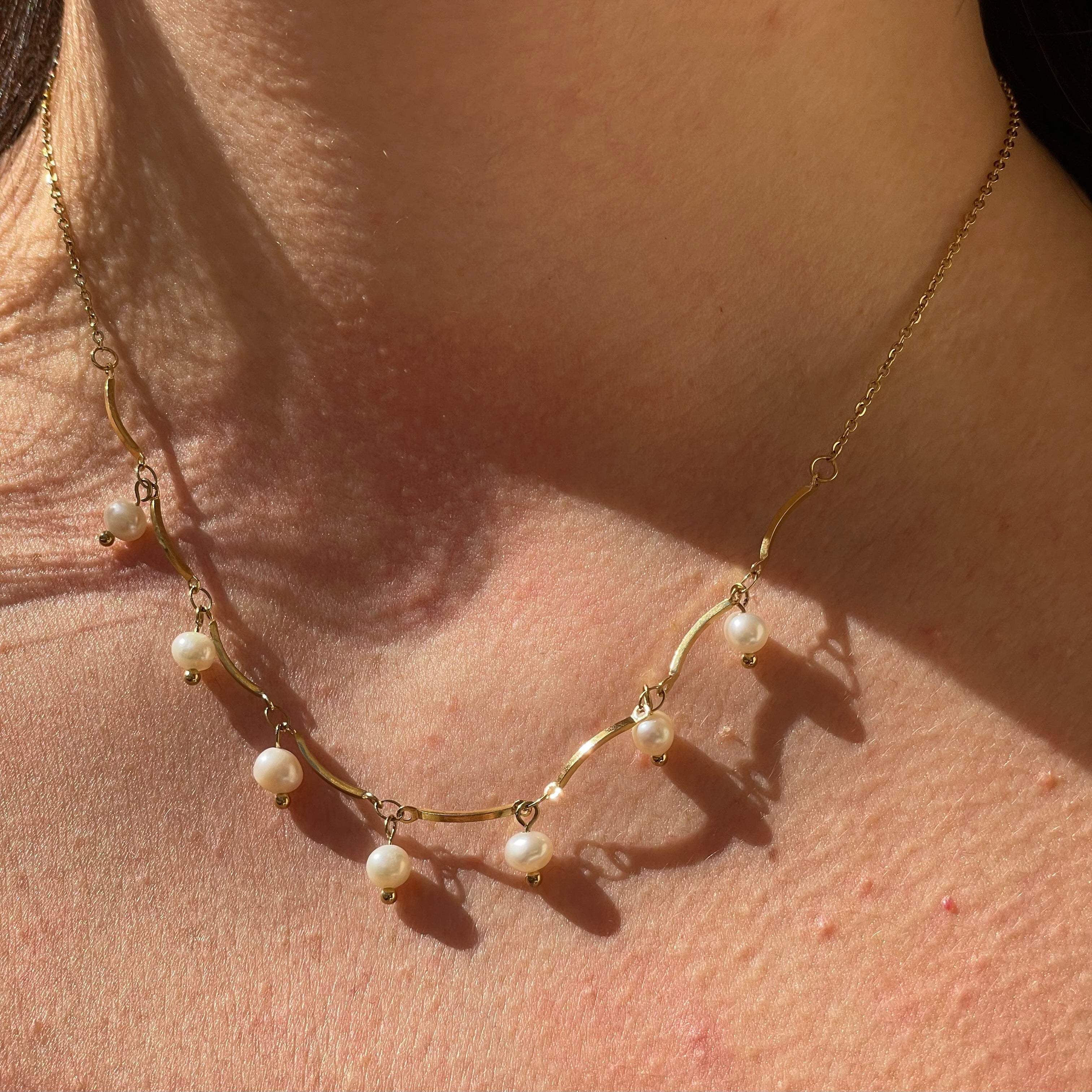 Collana con perle pendenti