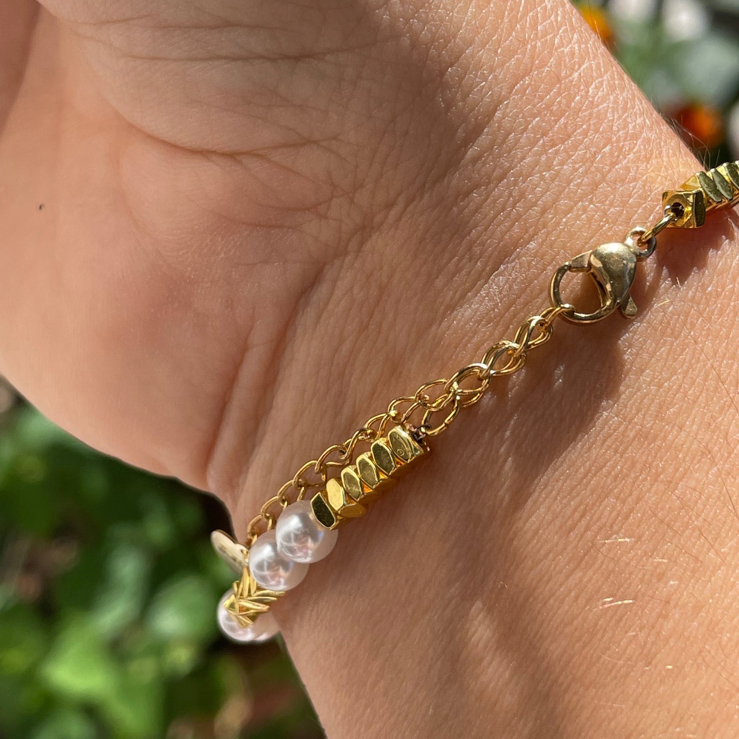 Bracciale con perle e quadratini