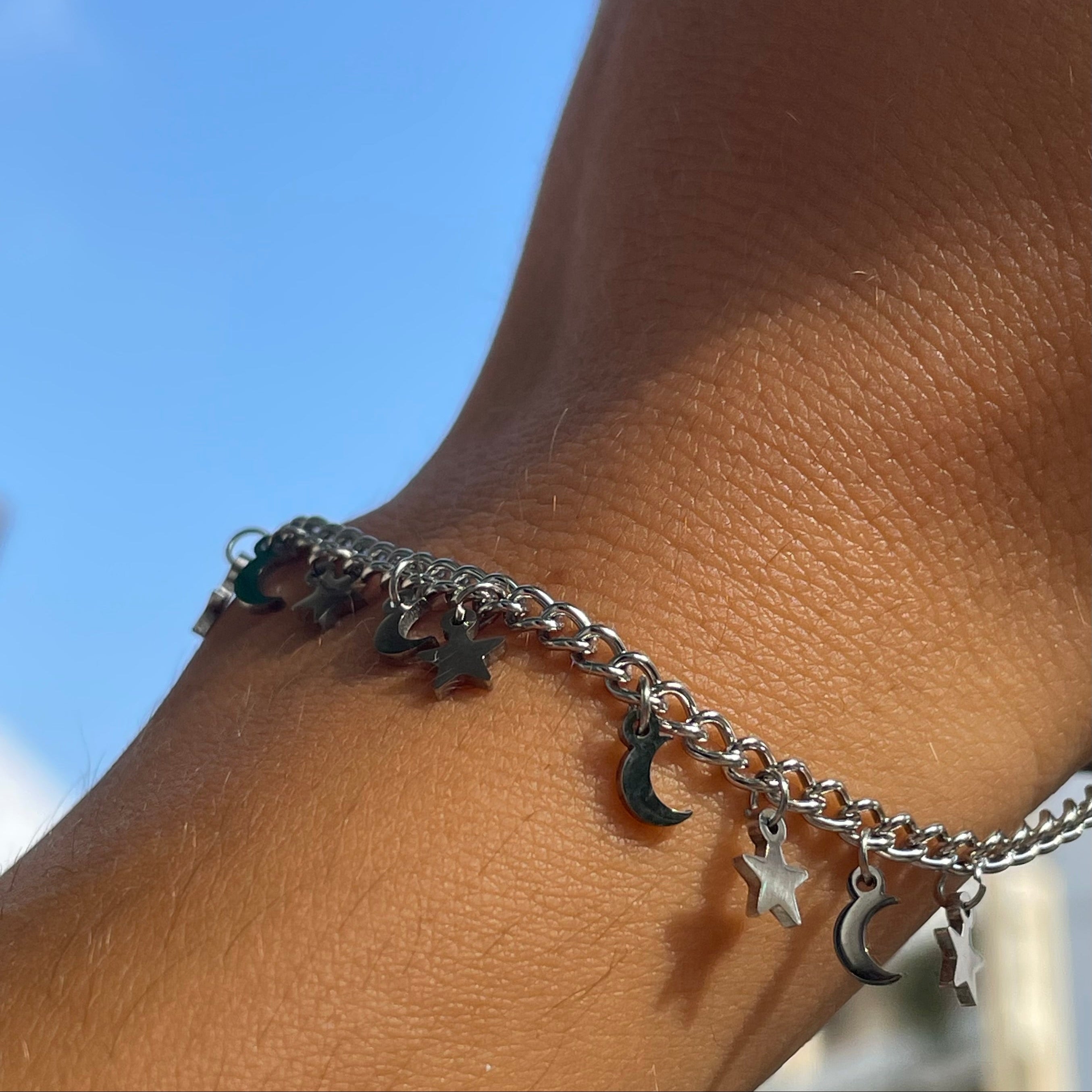 Bracciale con stelle e lune in 2 colori