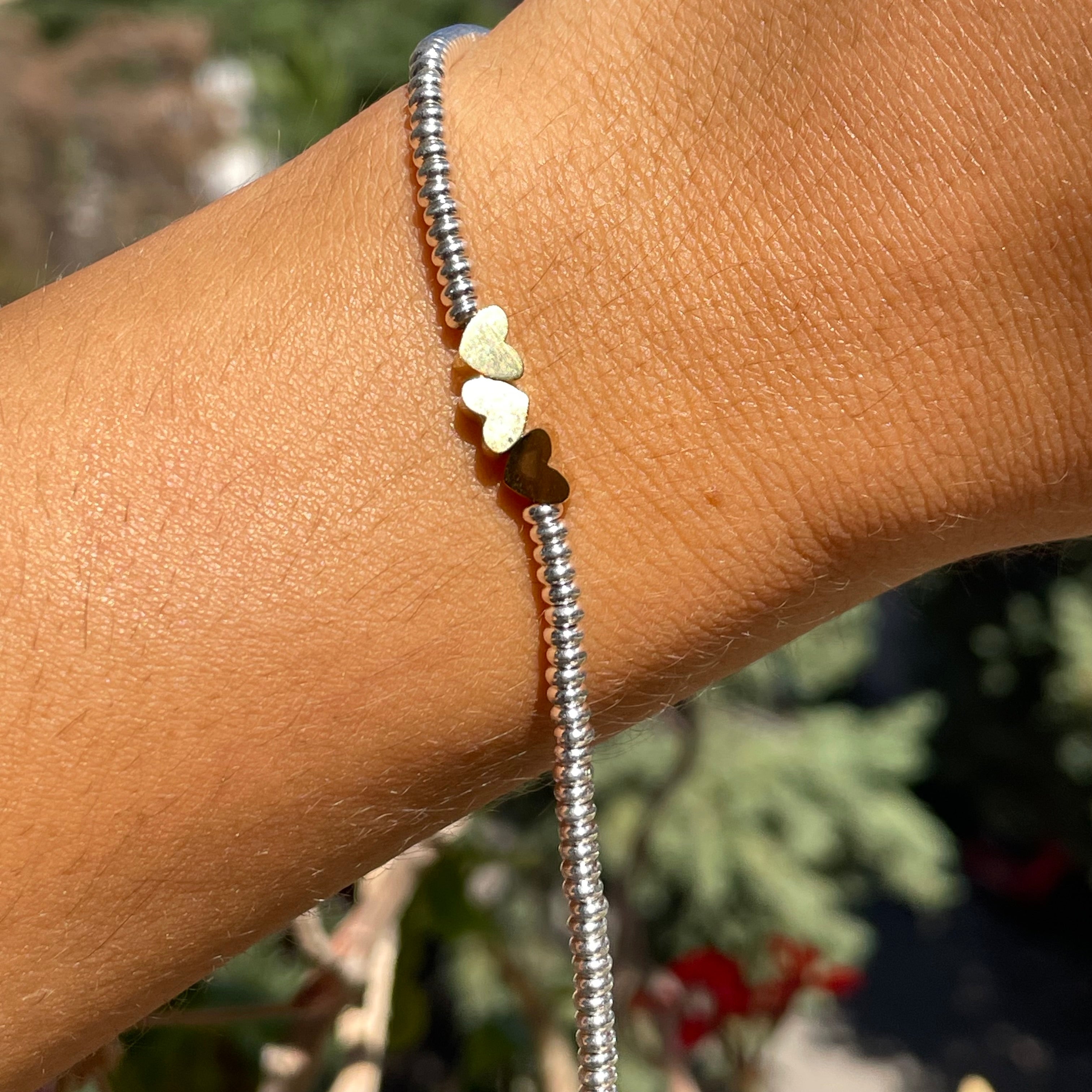 Bracciale tre cuori in 2 colori