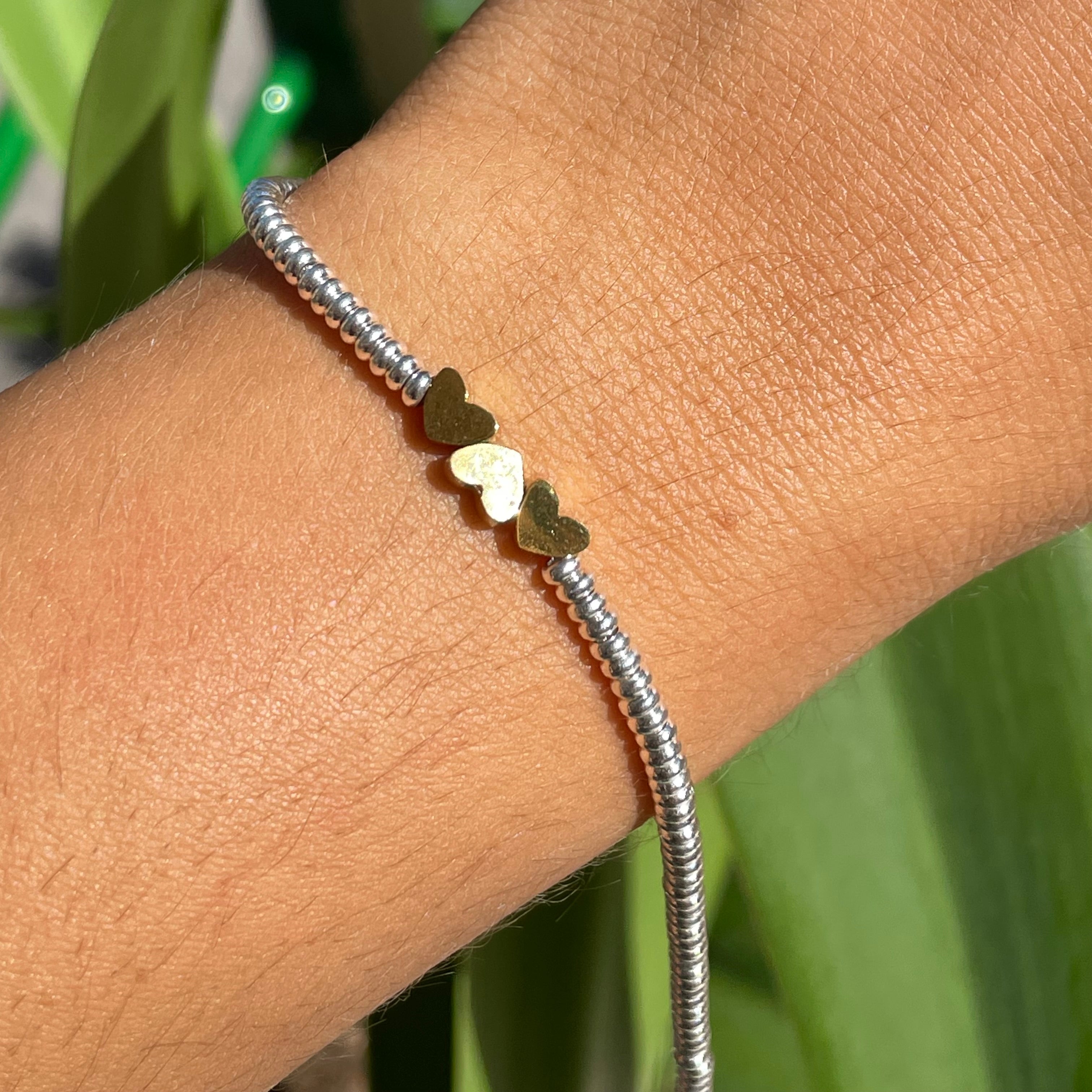 Bracciale tre cuori in 2 colori