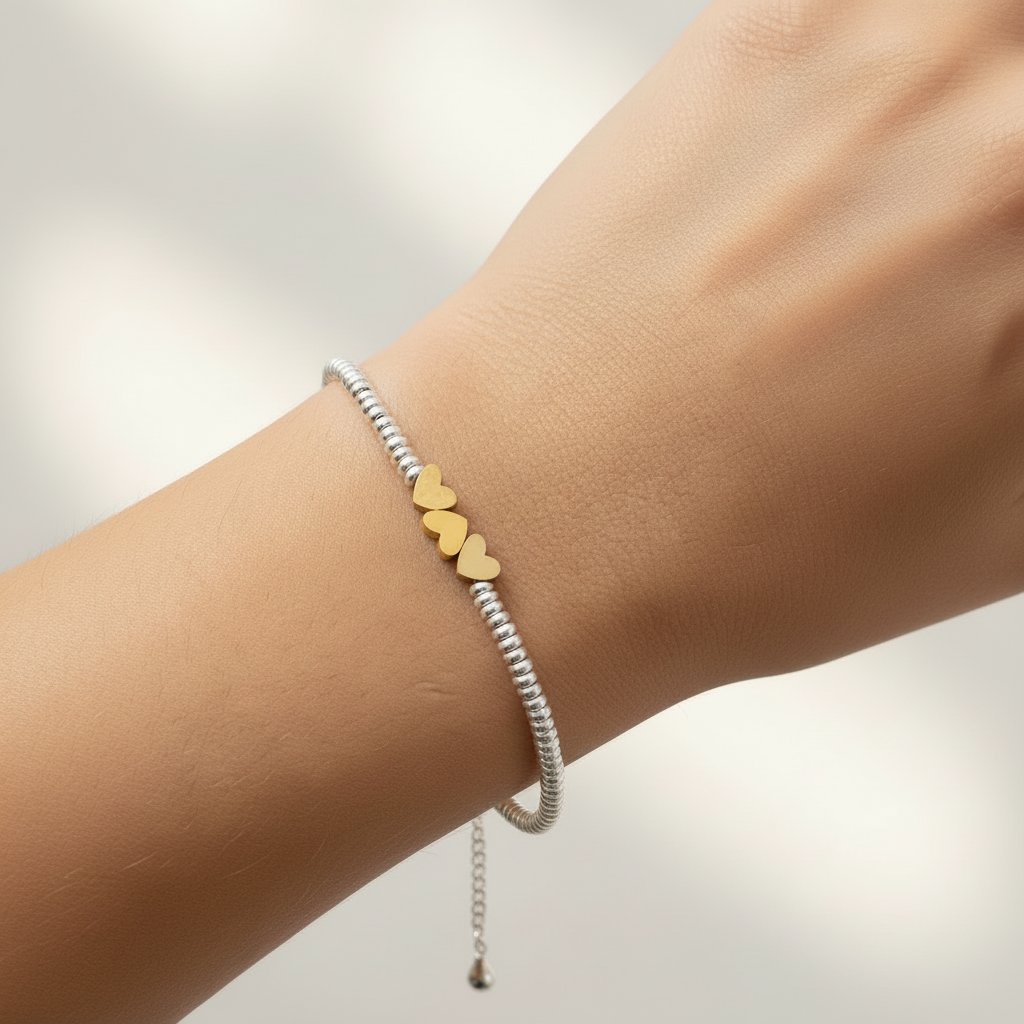 Bracciale tre cuori in 2 colori