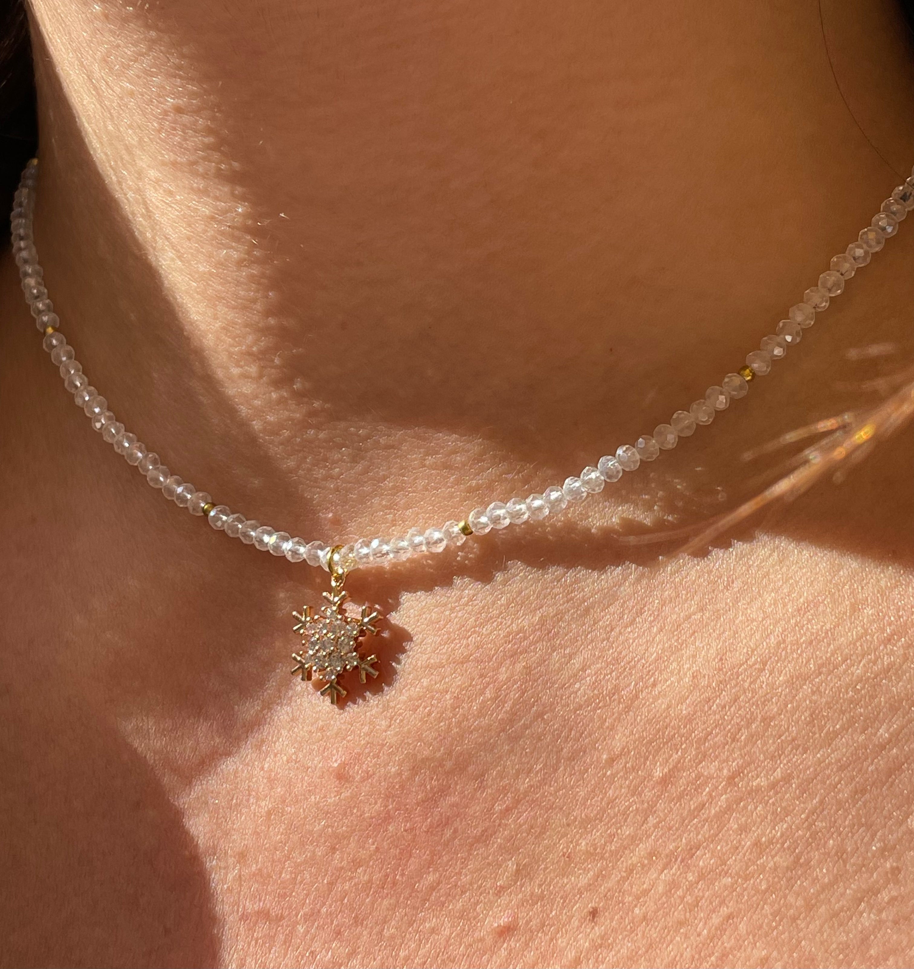 Collana con perline e fiocco di neve